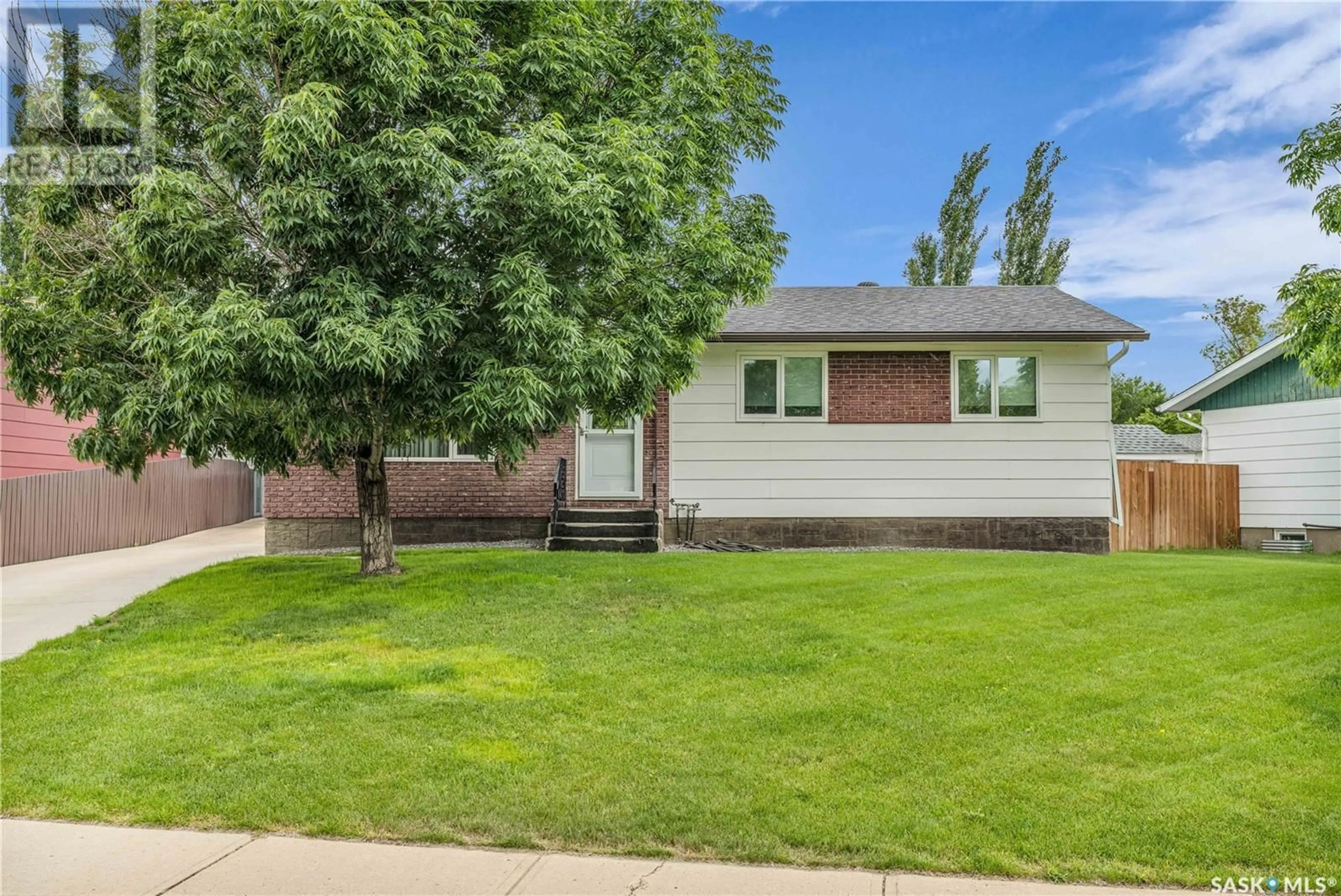 Home with vinyl exterior material, street for 9025 ABBOTT AVENUE, North Battleford Saskatchewan S9A3H7