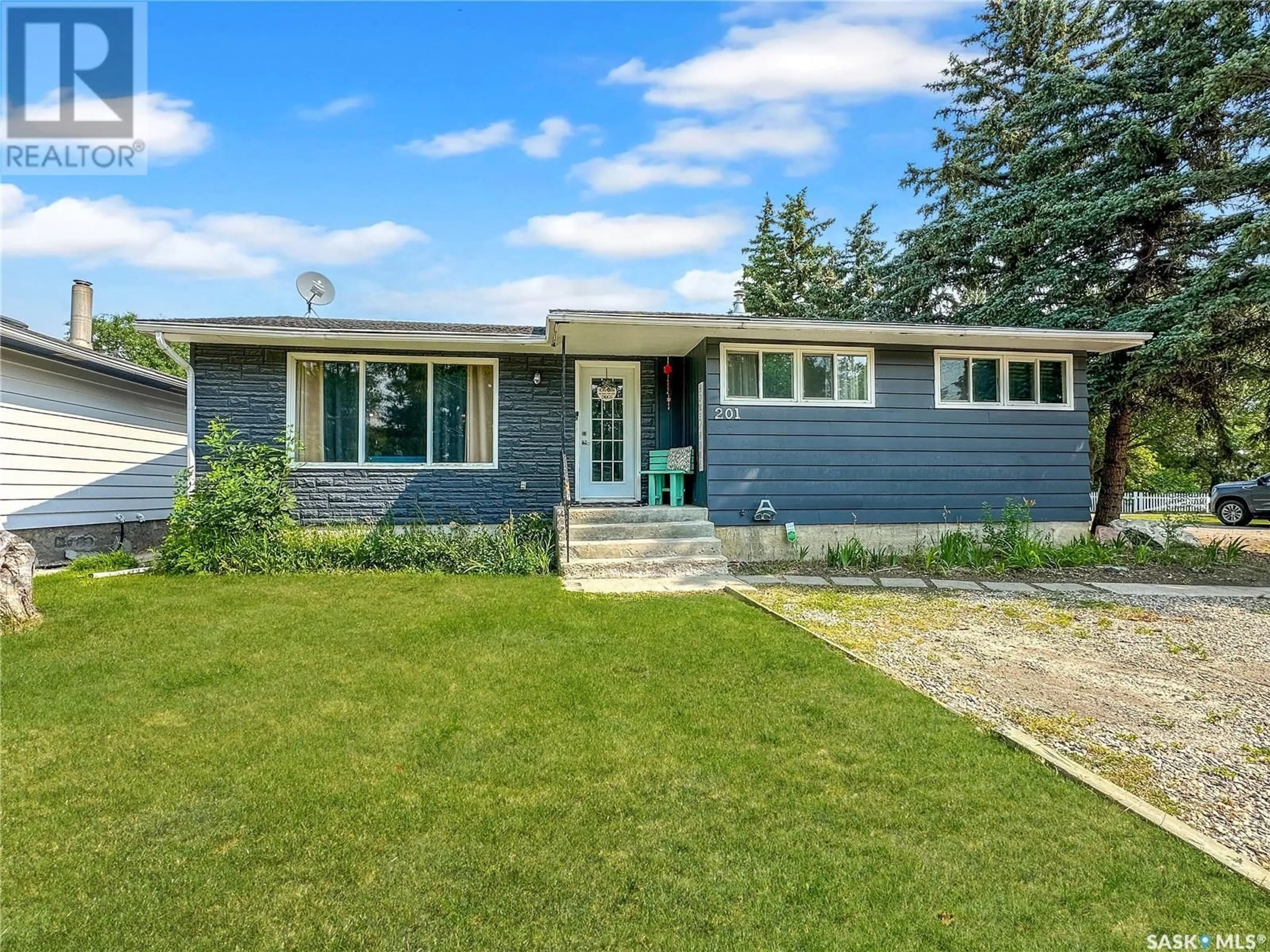 Home with vinyl exterior material, street for 201 LILY STREET, Balcarres Saskatchewan S0G0C0