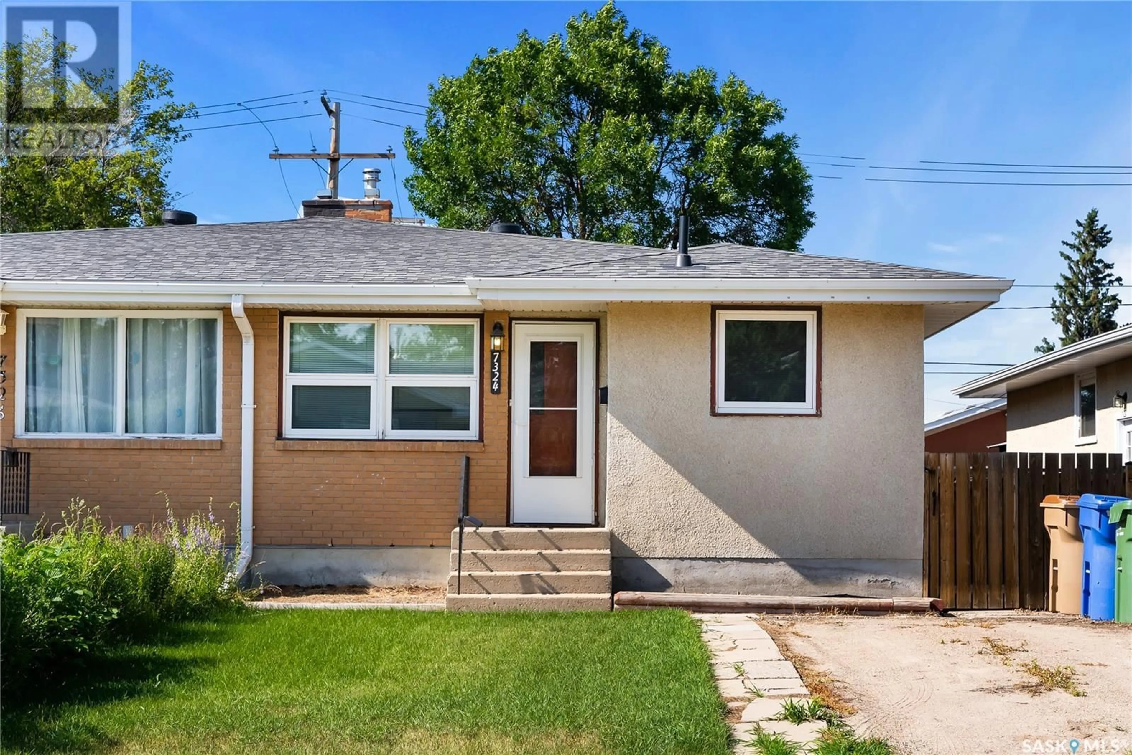 Home with vinyl exterior material, street for 7324 BOWMAN AVENUE, Regina Saskatchewan S4T6K8