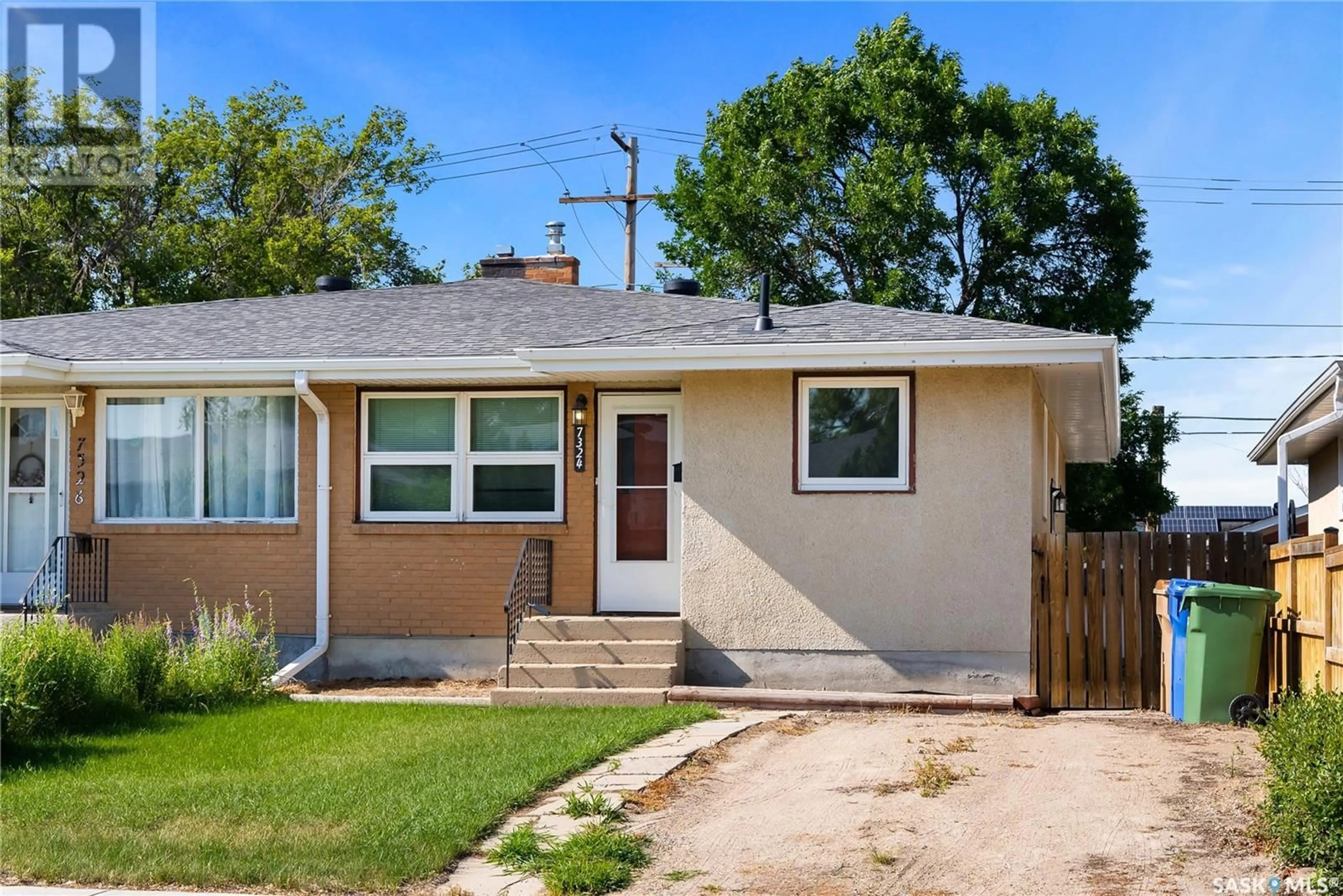 Home with vinyl exterior material, street for 7324 BOWMAN AVENUE, Regina Saskatchewan S4T6K8