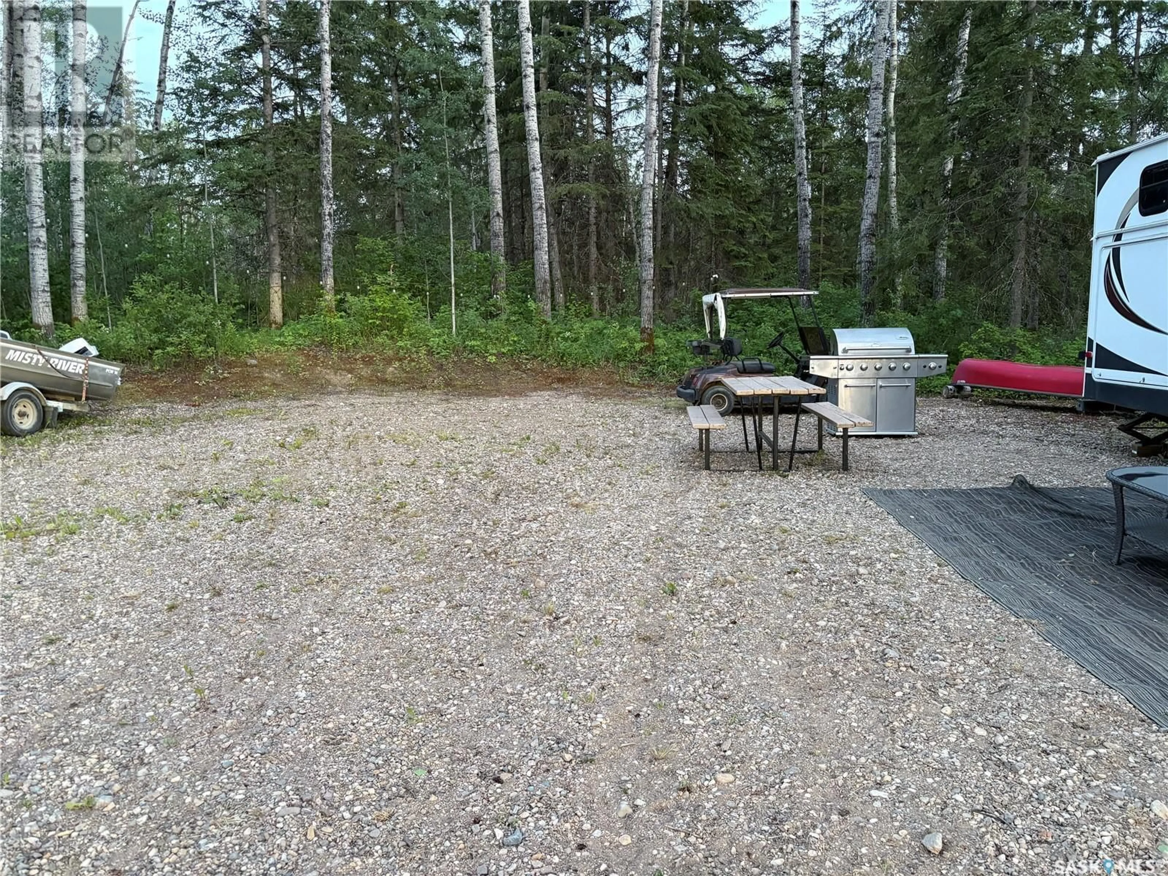 Patio, forest/trees view for 11 LAKESHORE ROAD, Big River Rm No. 555 Saskatchewan S0J0E0