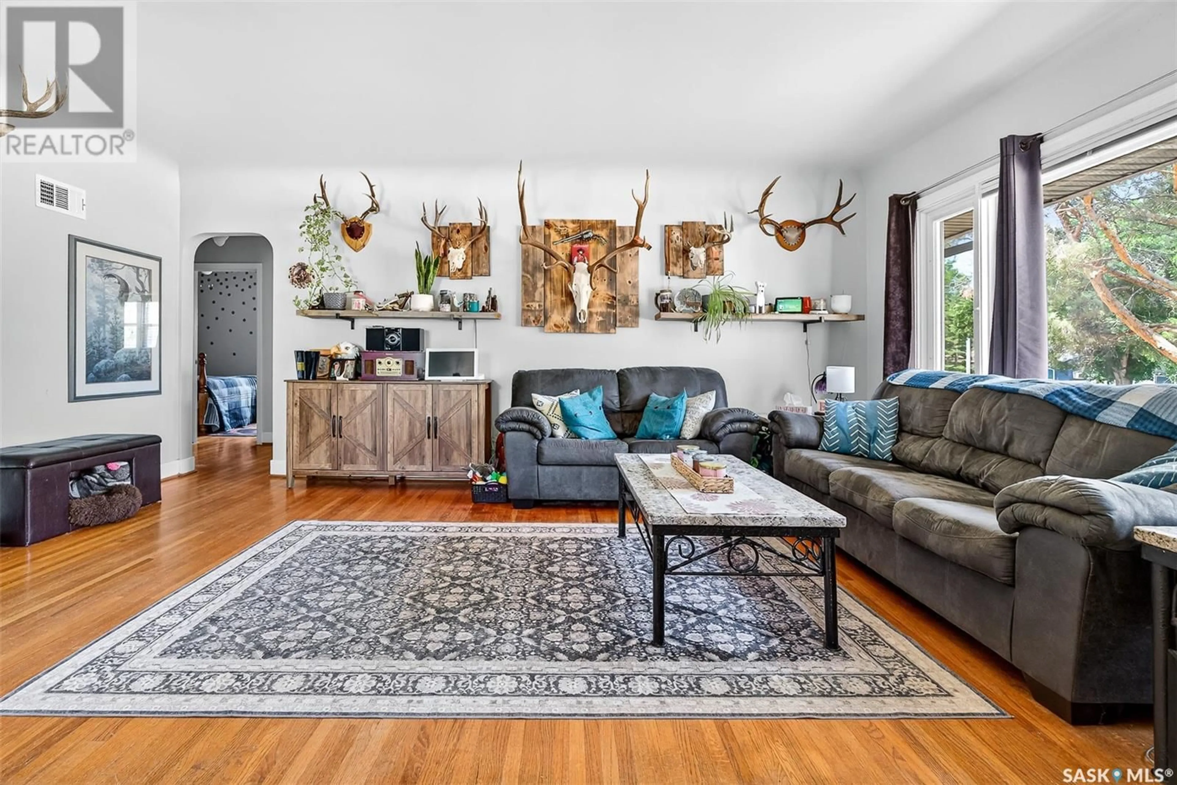 Living room with furniture, unknown for 1001 COTEAU STREET, Moose Jaw Saskatchewan S6H5G3