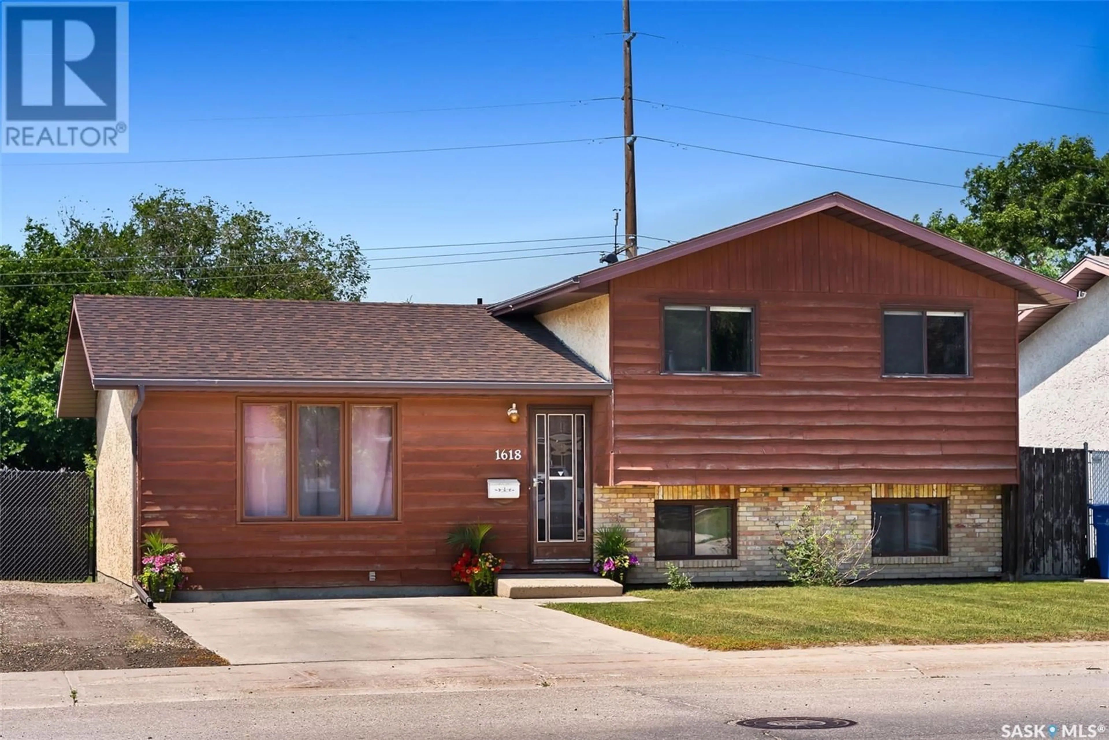 Home with brick exterior material, street for 1618 FLEET STREET, Regina Saskatchewan S4N5S3