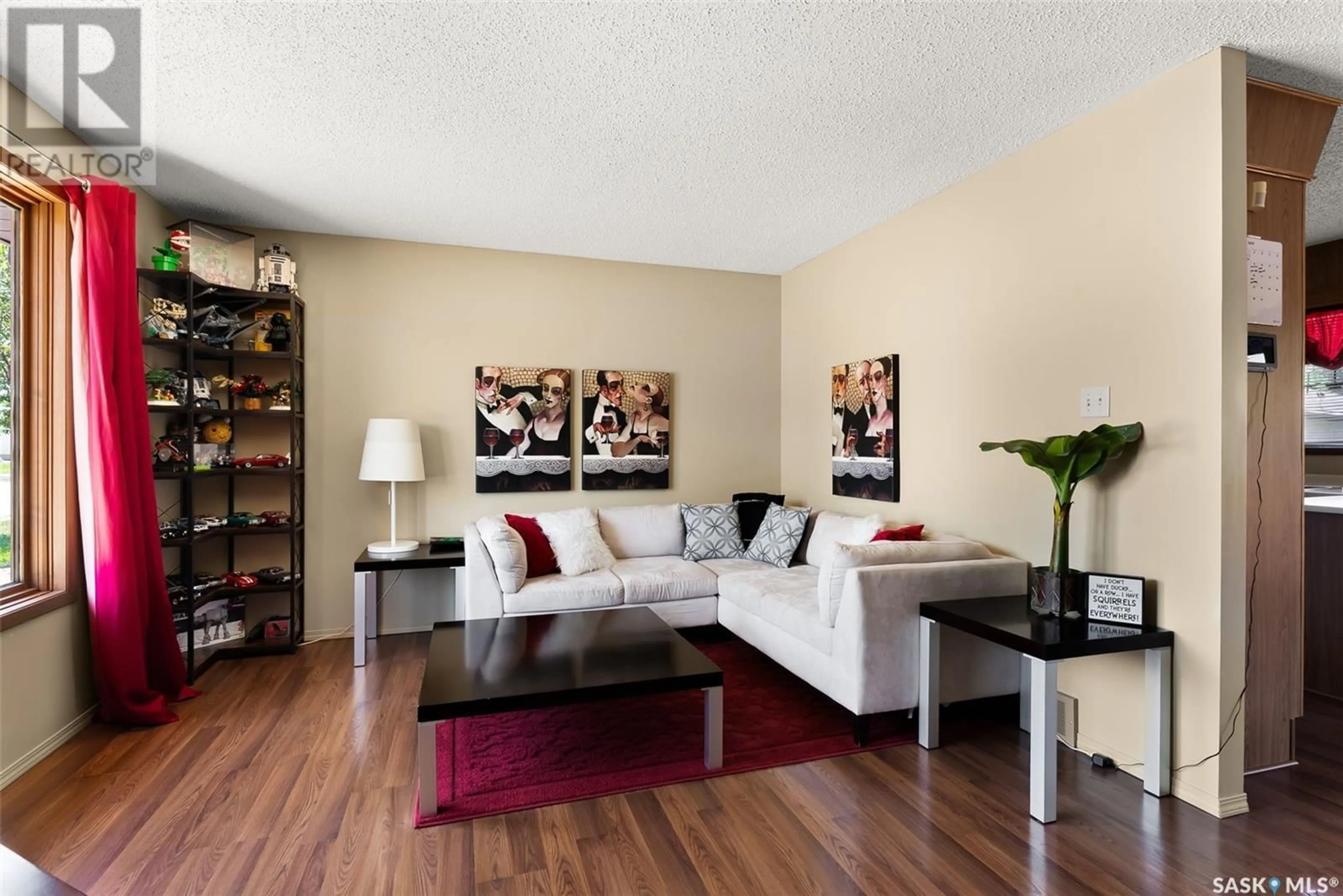Living room with furniture, wood/laminate floor for 1618 FLEET STREET, Regina Saskatchewan S4N5S3