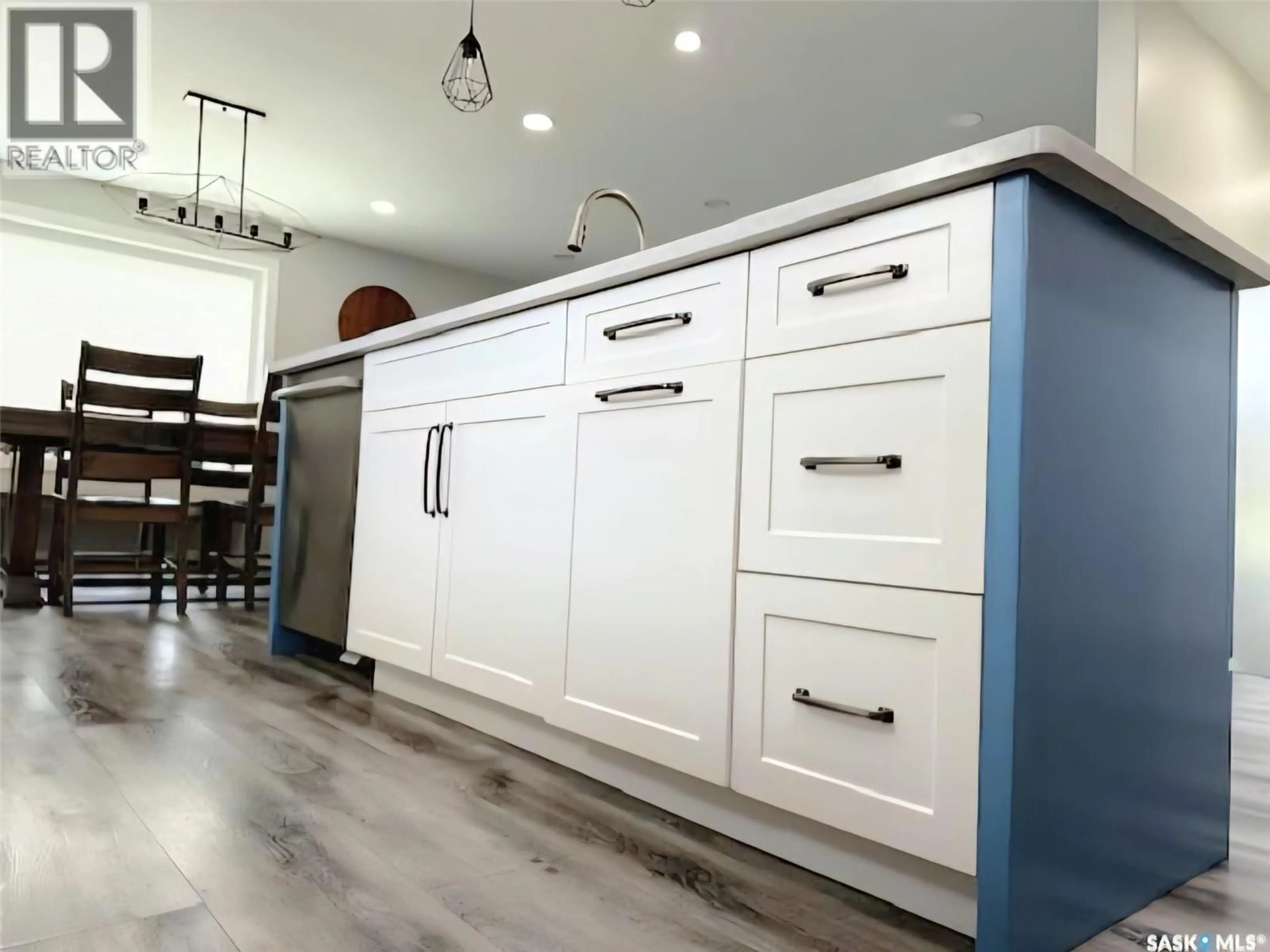 Open concept kitchen, wood/laminate floor for 310 MAIN STREET, Neudorf Saskatchewan S0A2T0