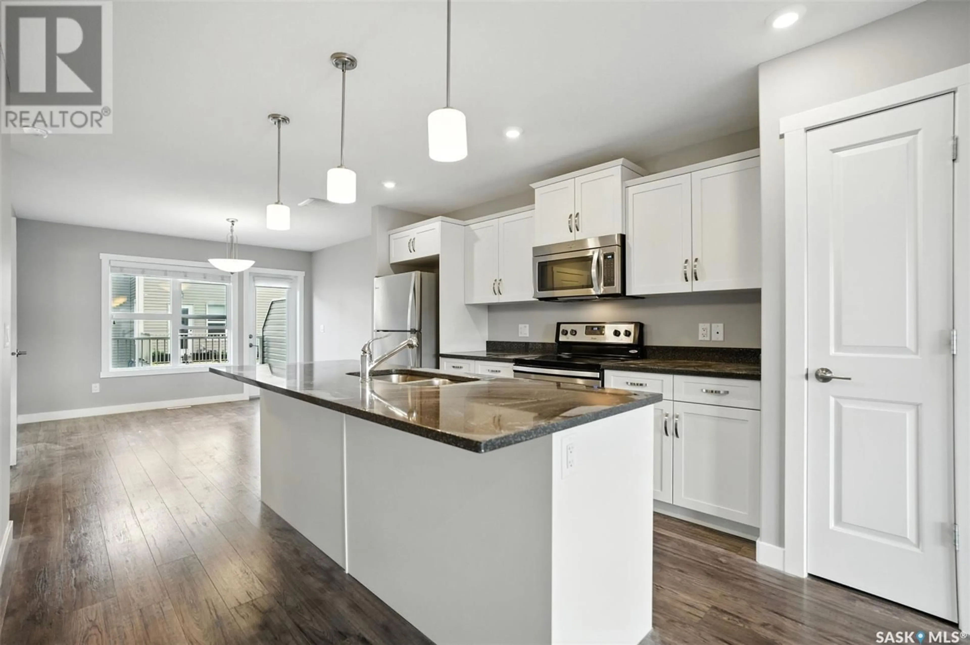 Open concept kitchen, unknown for 212 542 PRINGLE CRESCENT, Saskatoon Saskatchewan S7T0W9