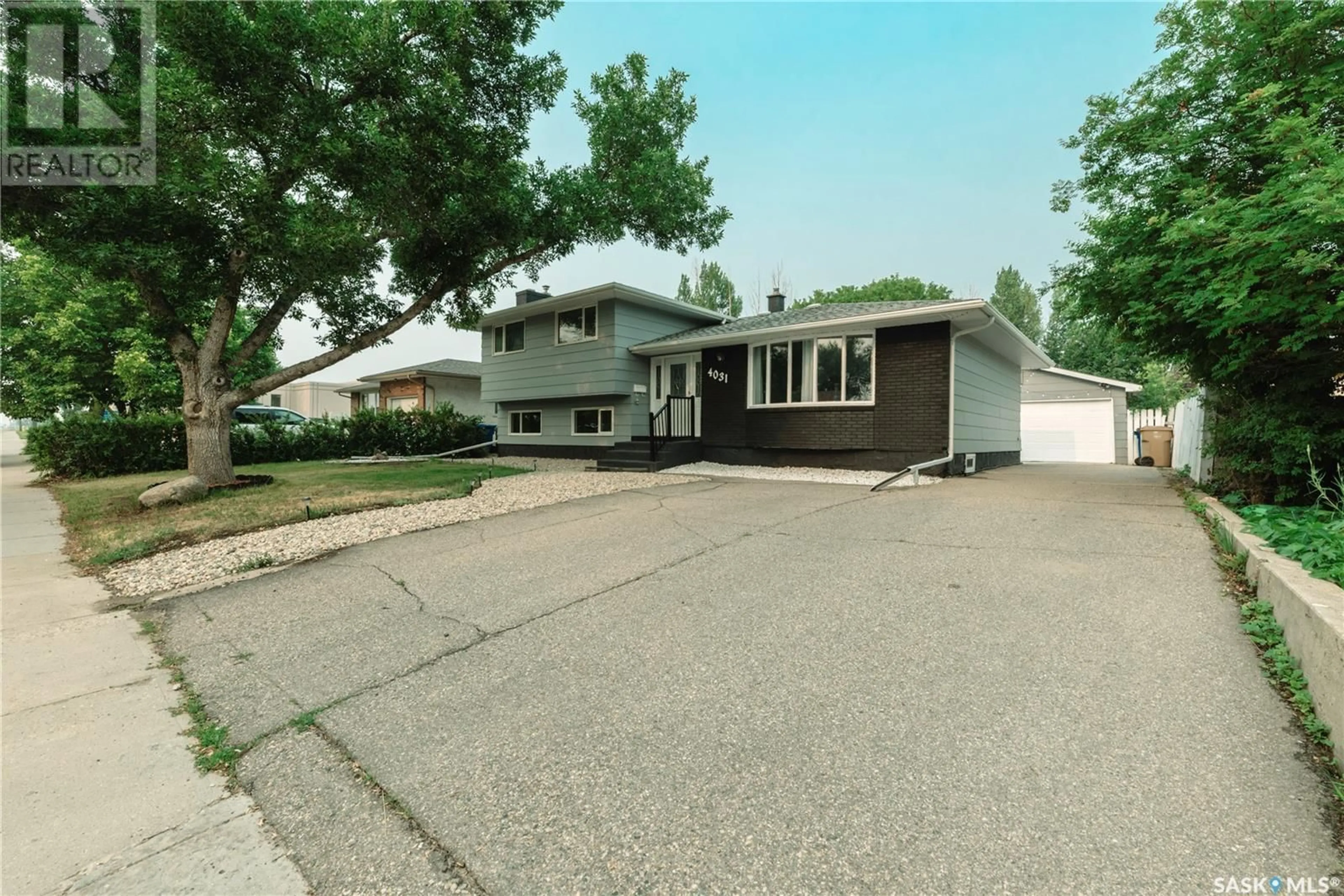 Home with vinyl exterior material, street for 4031 PASQUA STREET, Regina Saskatchewan S4S6C8