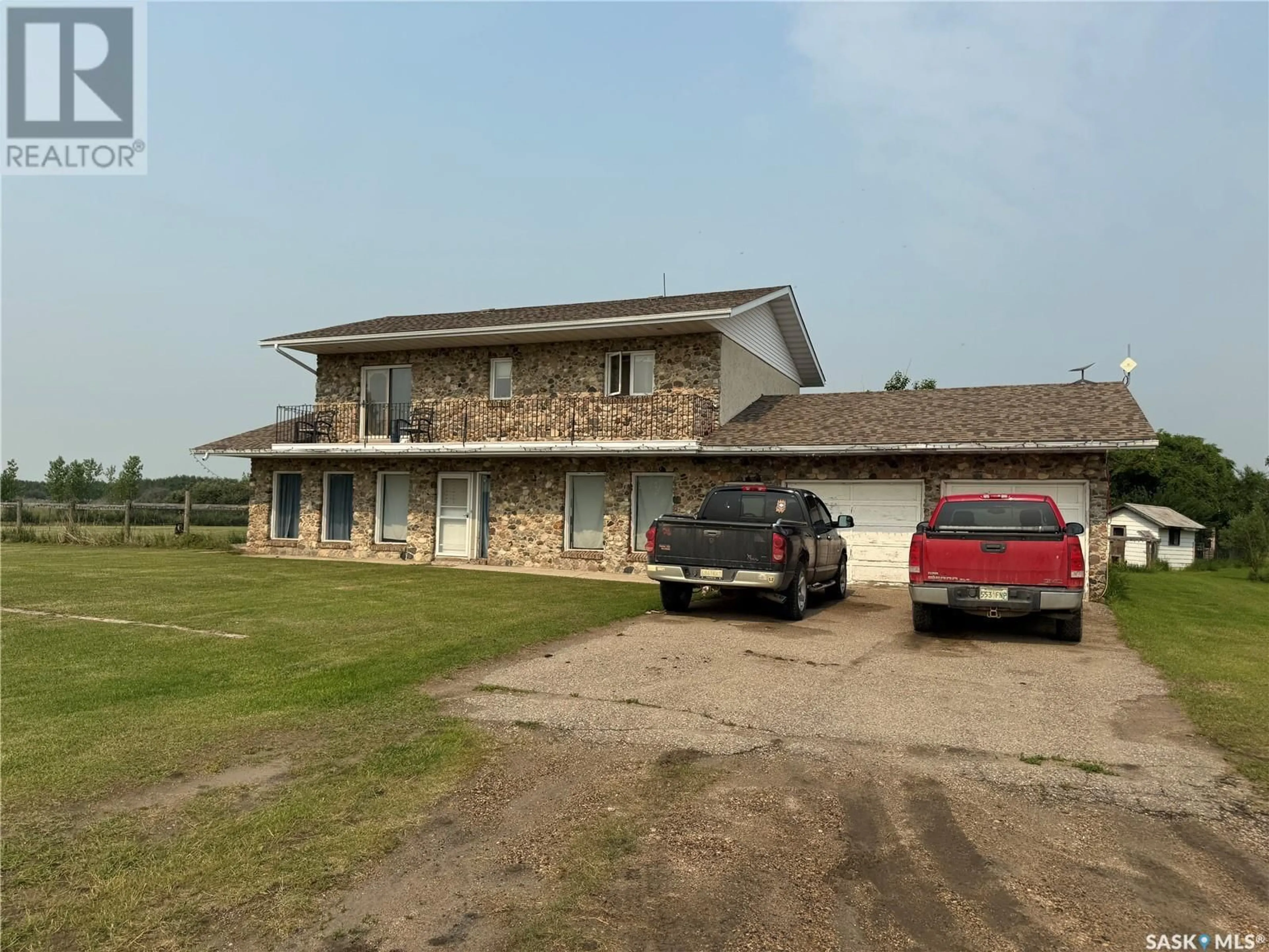 A pic from outside/outdoor area/front of a property/back of a property/a pic from drone, building for Bradford/Wright ACREAGE, Vanscoy Rm No. 345 Saskatchewan S0K1V0