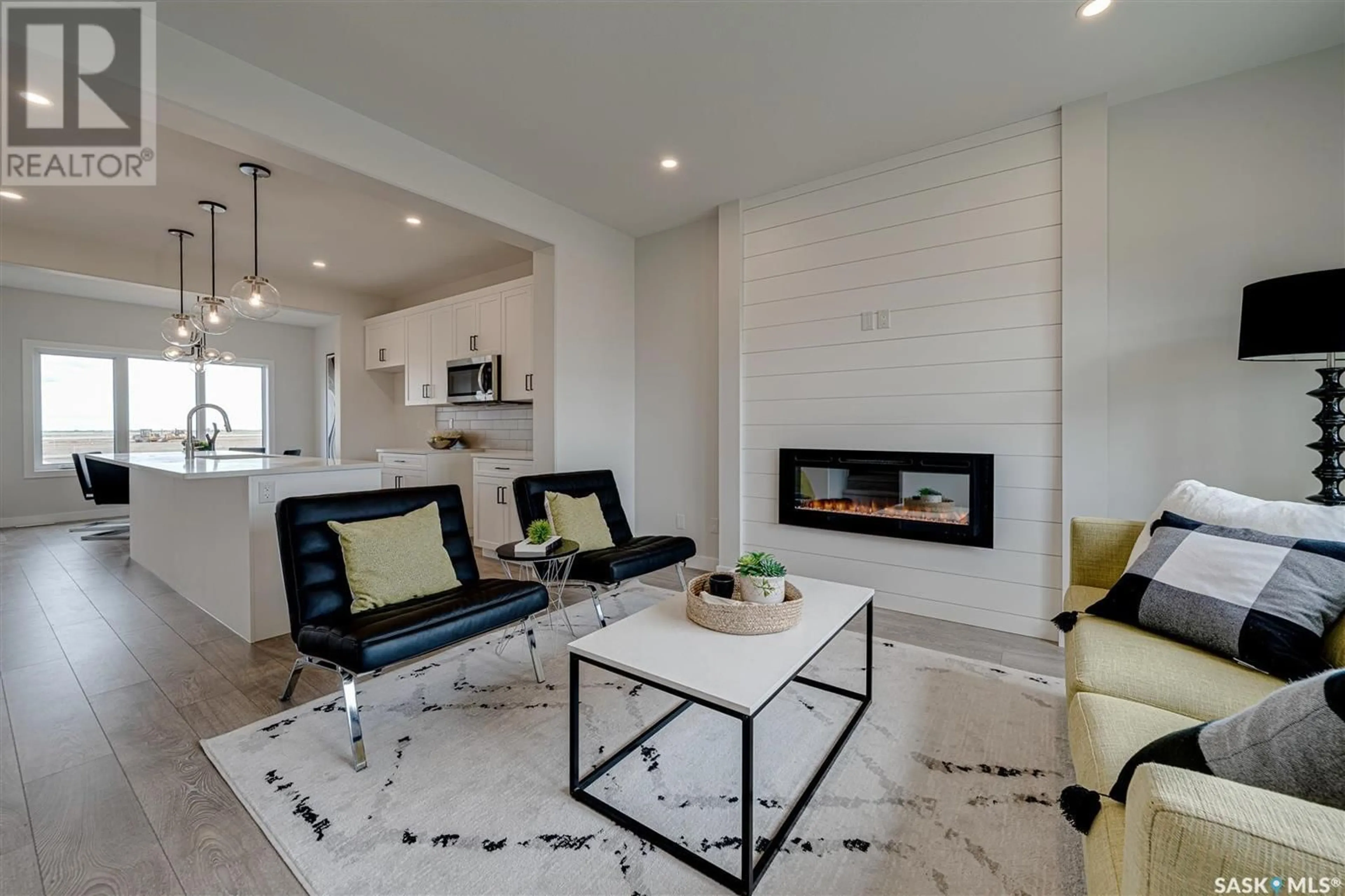 Living room with furniture, ceramic/tile floor for 3167 BOWEN STREET, Regina Saskatchewan S4N7K9