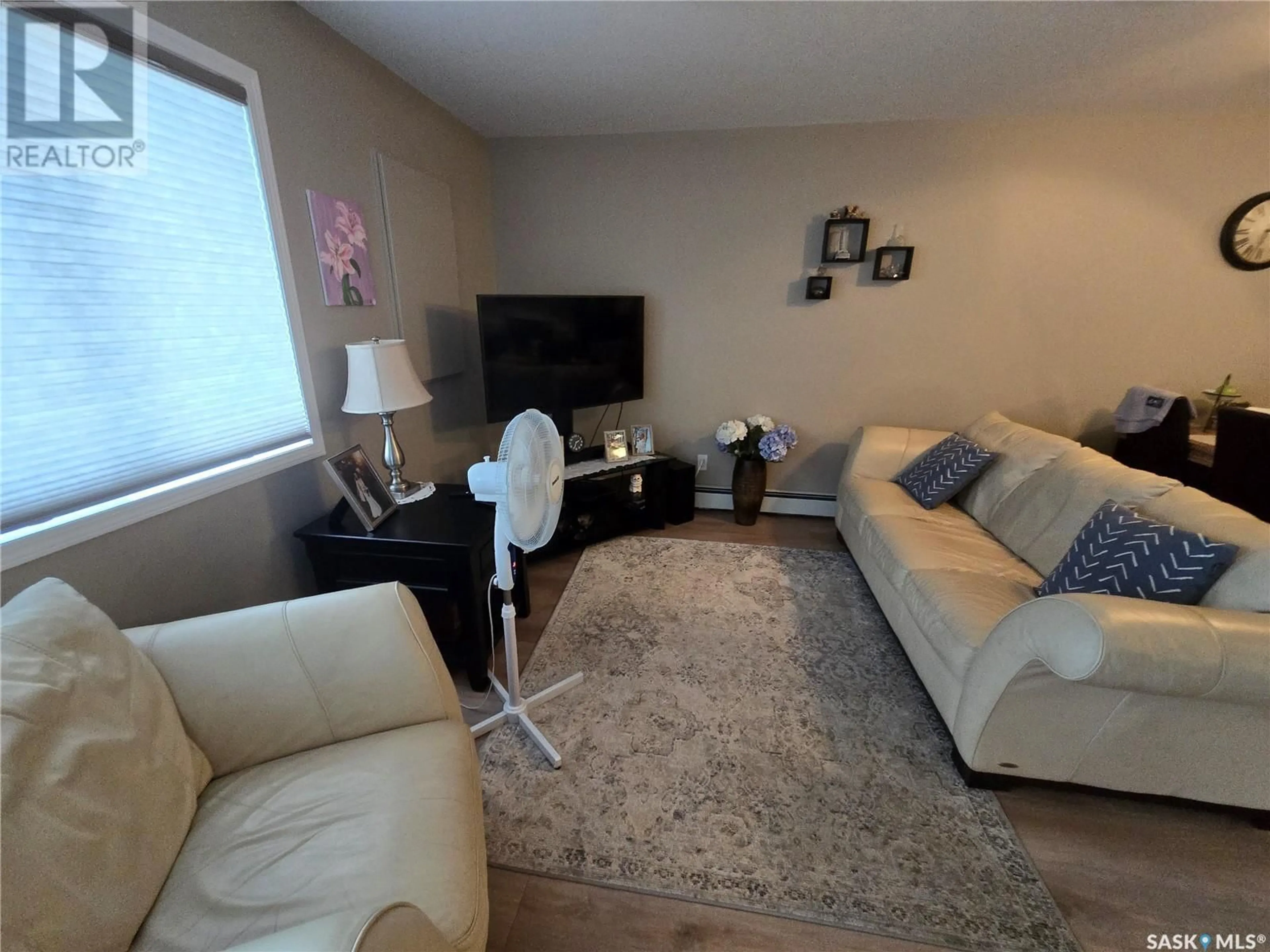 Living room with furniture, unknown for 203 - 825 GLADSTONE STREET, Swift Current Saskatchewan S9H5P1
