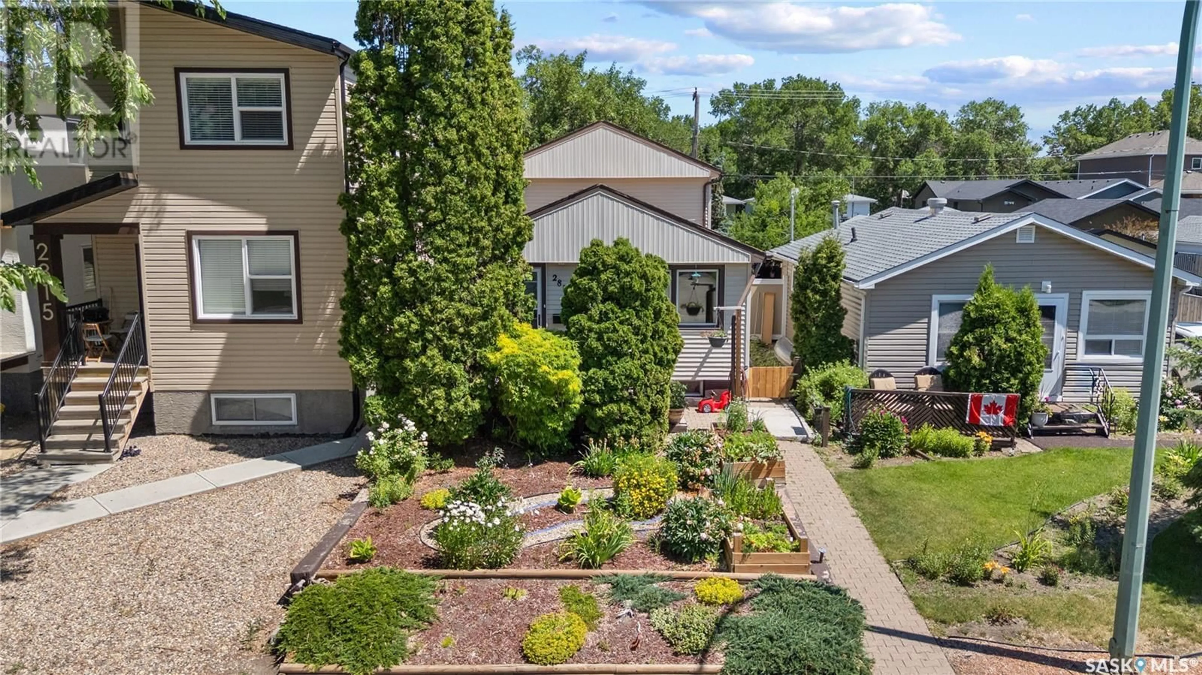 A pic from outside/outdoor area/front of a property/back of a property/a pic from drone, street for 2819 MCDONALD STREET, Regina Saskatchewan S4N3A1