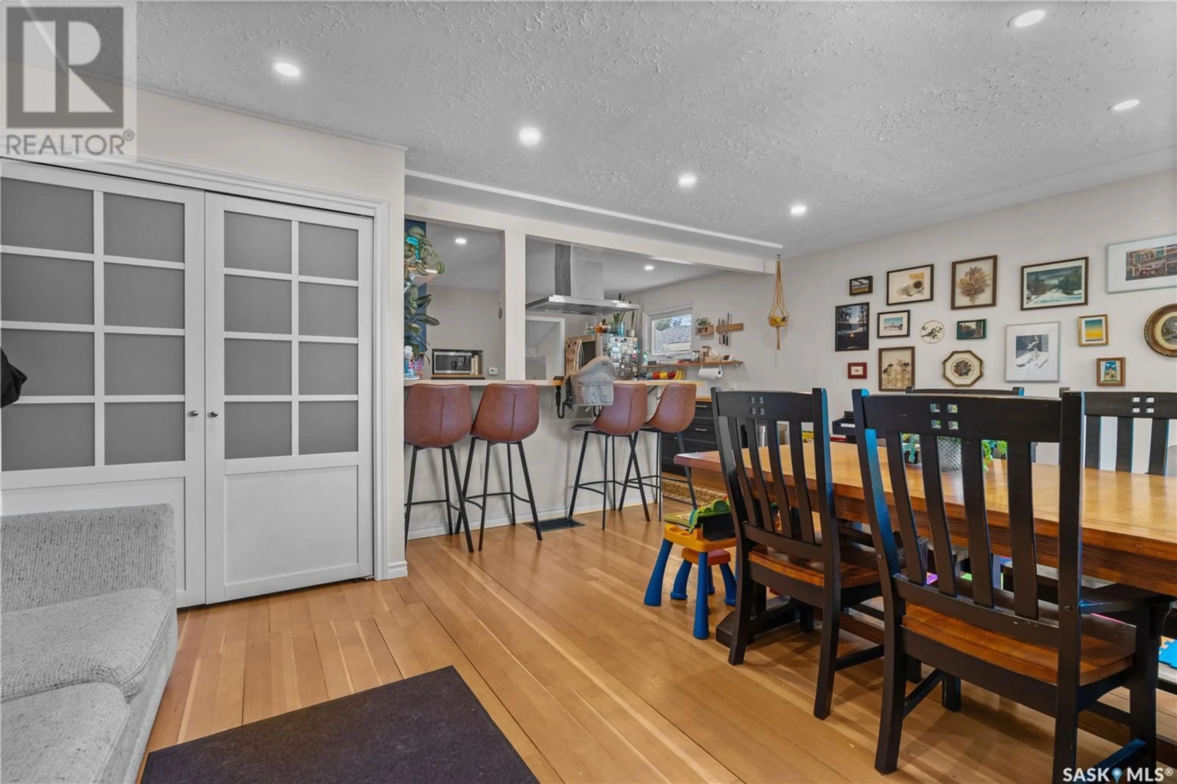 Open concept kitchen, wood/laminate floor for 2819 MCDONALD STREET, Regina Saskatchewan S4N3A1