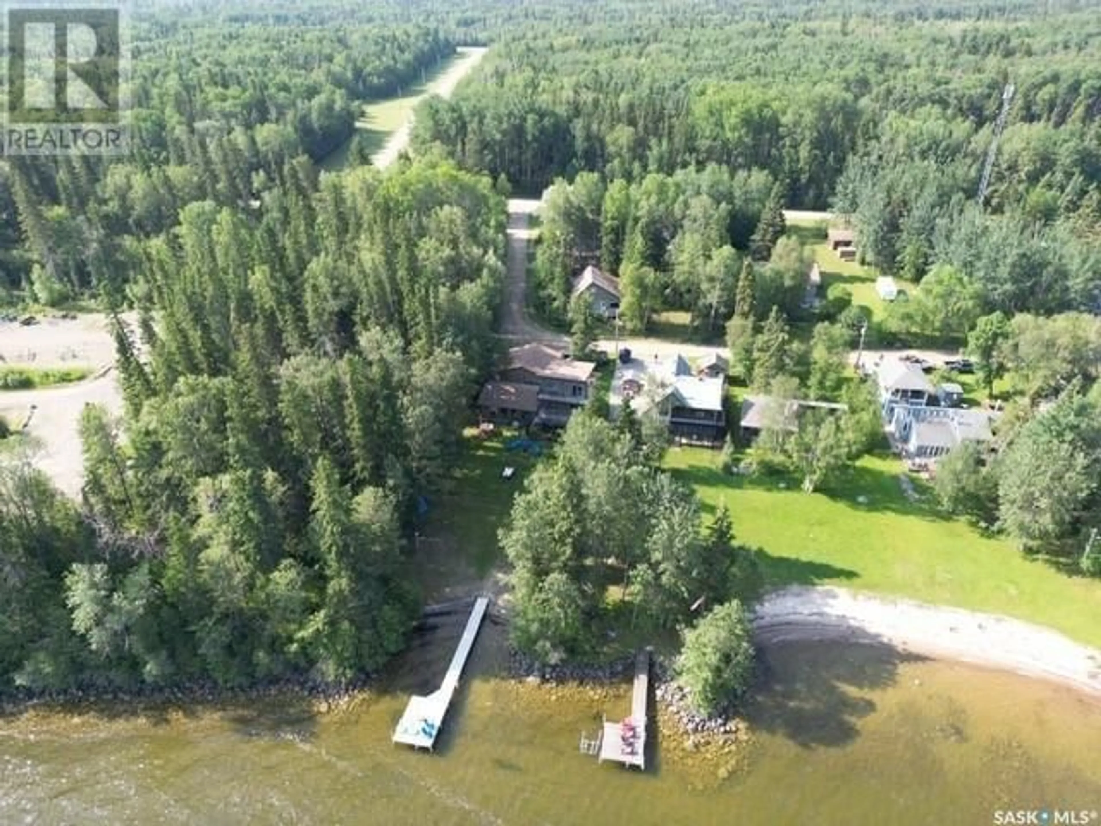 A pic from outside/outdoor area/front of a property/back of a property/a pic from drone, water/lake/river/ocean view for 5 CLEARSAND DRIVE, Candle Lake Saskatchewan S0J3E0