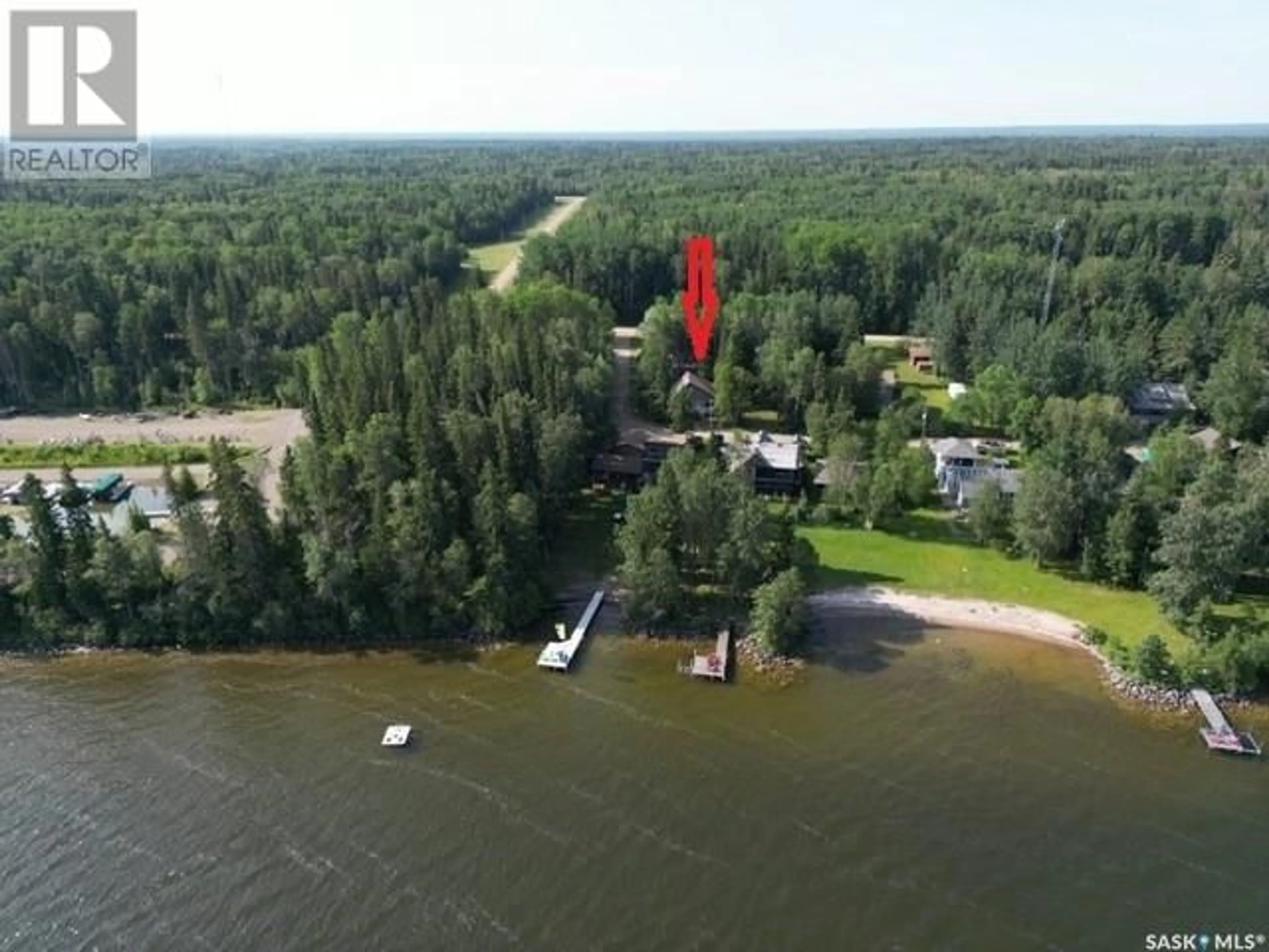 A pic from outside/outdoor area/front of a property/back of a property/a pic from drone, water/lake/river/ocean view for 5 CLEARSAND DRIVE, Candle Lake Saskatchewan S0J3E0
