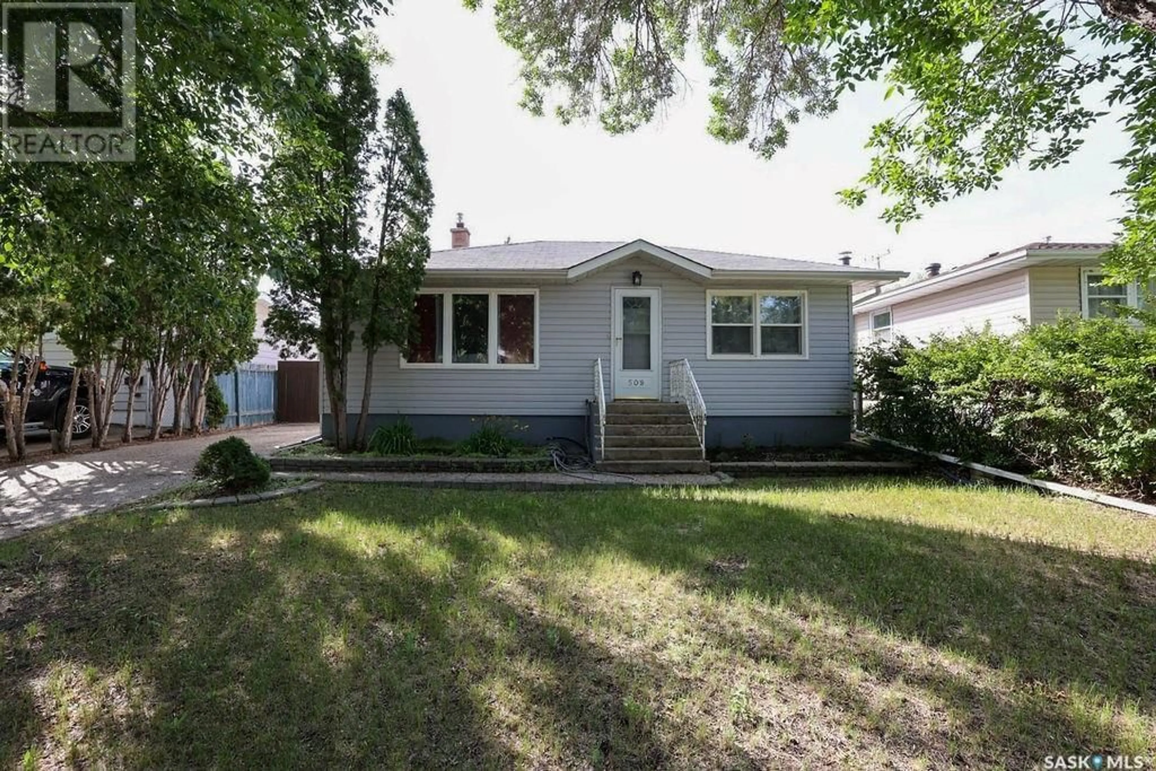 Home with vinyl exterior material, street for 509 18TH AVENUE, Regina Saskatchewan S4N1E5