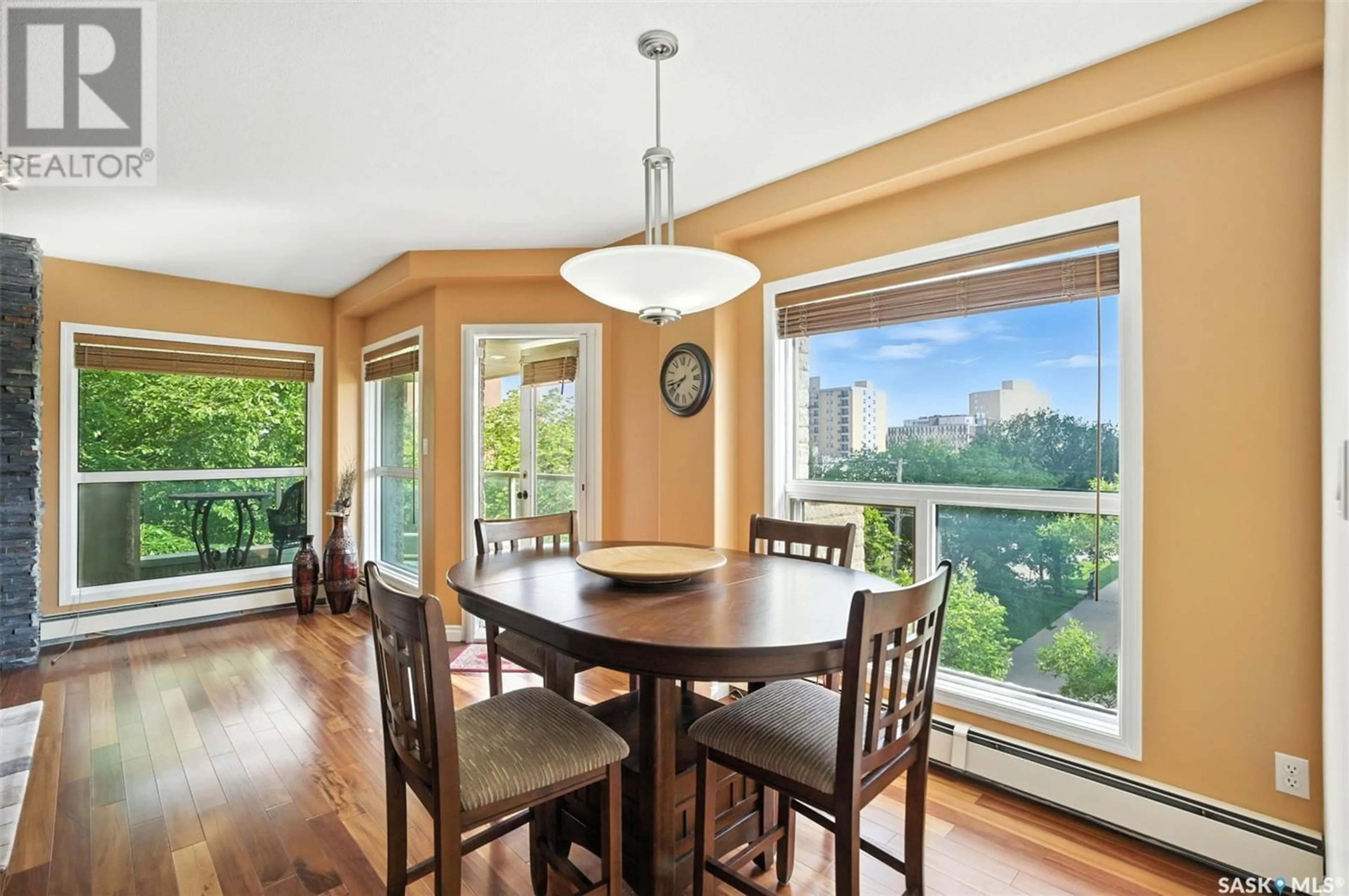 Dining room, wood/laminate floor for 303 - 406 5TH AVENUE, Saskatoon Saskatchewan S7K2P6