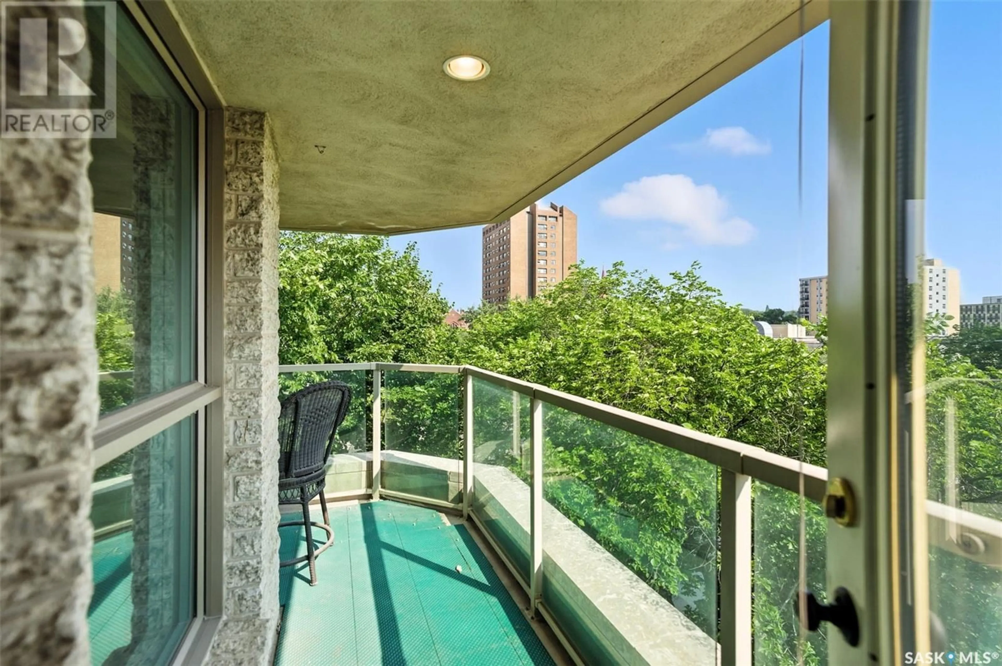 Balcony in the apartment, city buildings view from balcony for 303 - 406 5TH AVENUE, Saskatoon Saskatchewan S7K2P6