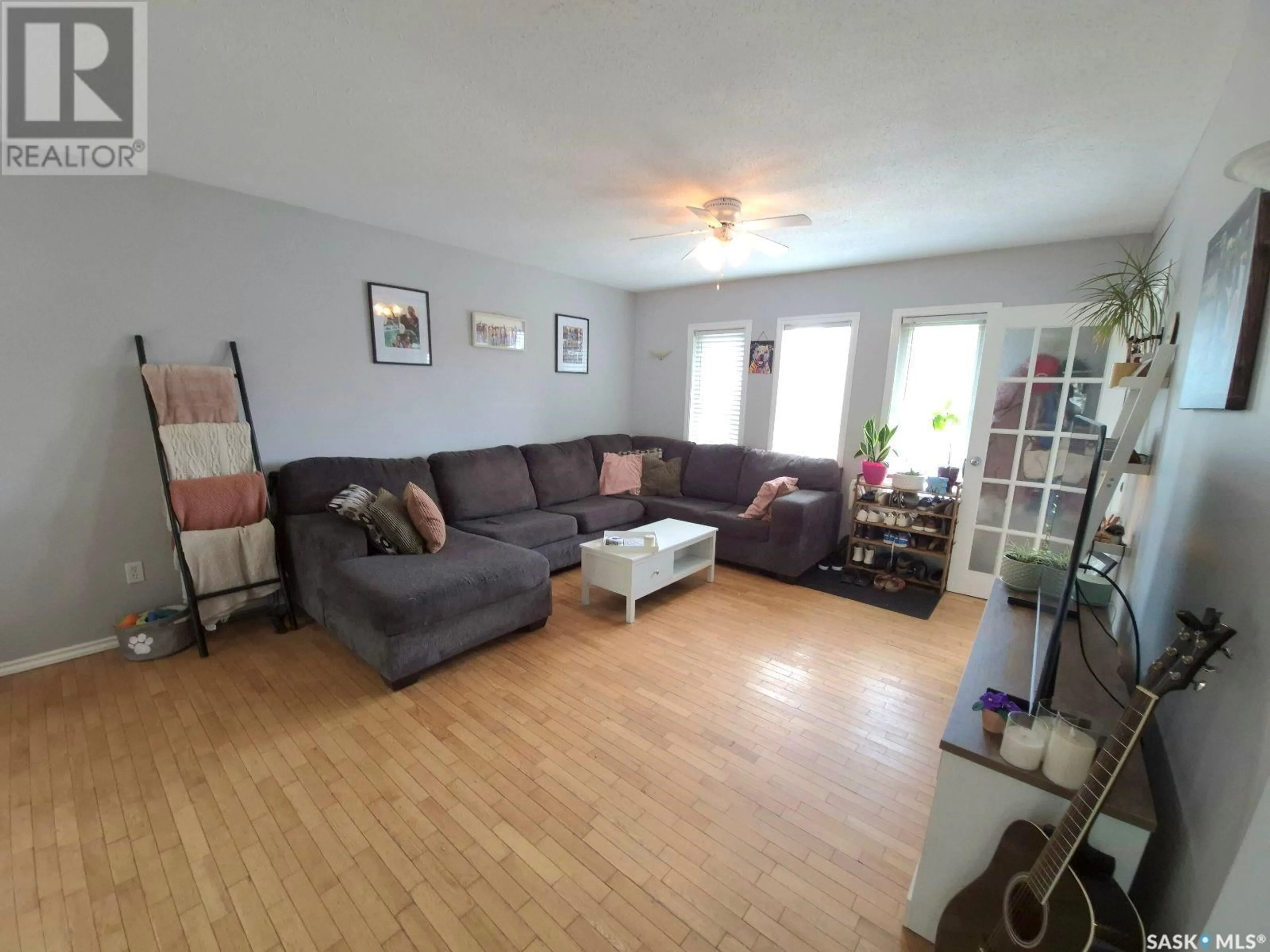 Living room with furniture, unknown for 718 6TH STREET, Prince Albert Saskatchewan S6V0M8