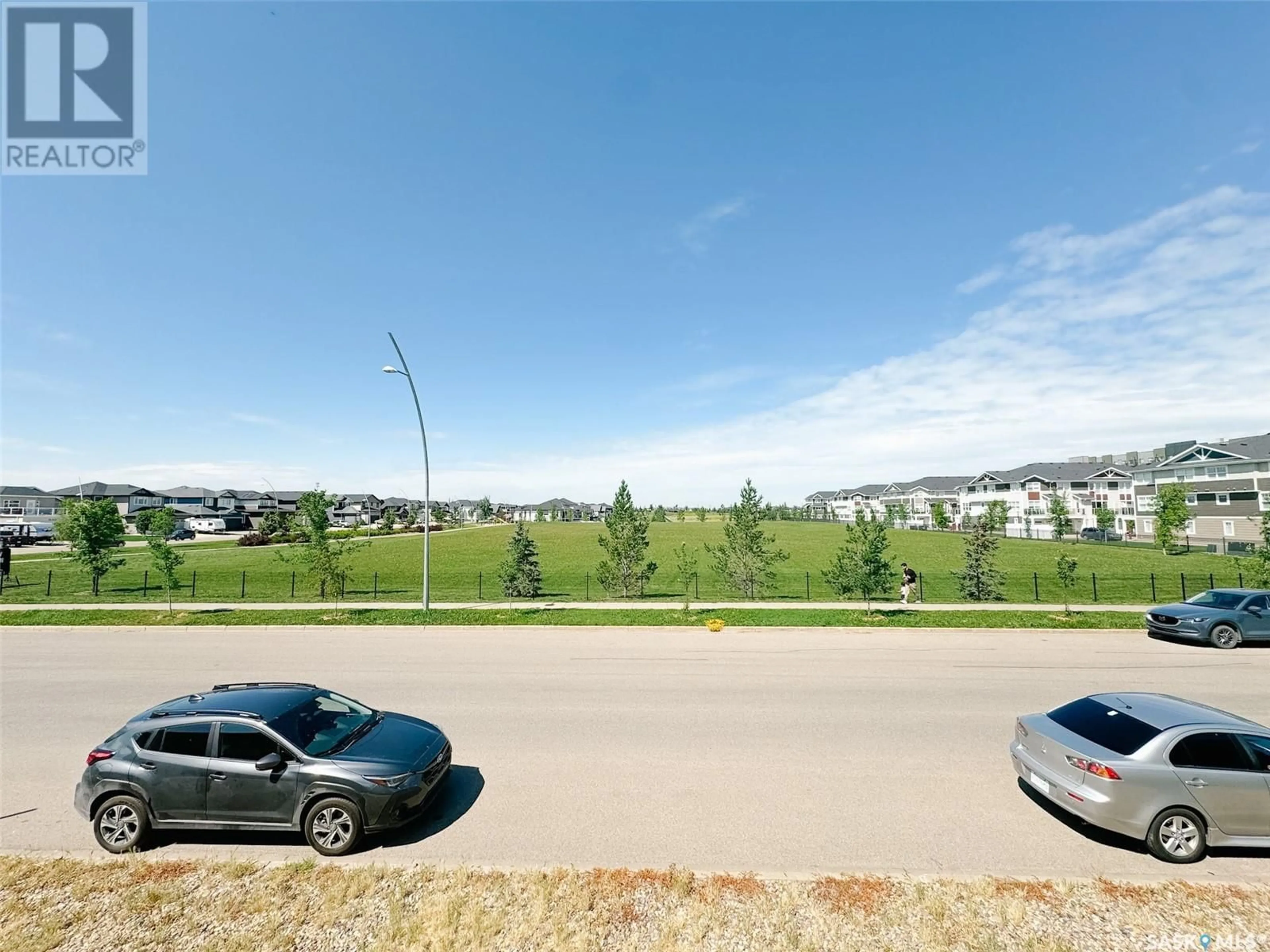 A pic from outside/outdoor area/front of a property/back of a property/a pic from drone, unknown for 575 MARLATTE LANE, Saskatoon Saskatchewan S7W0S8