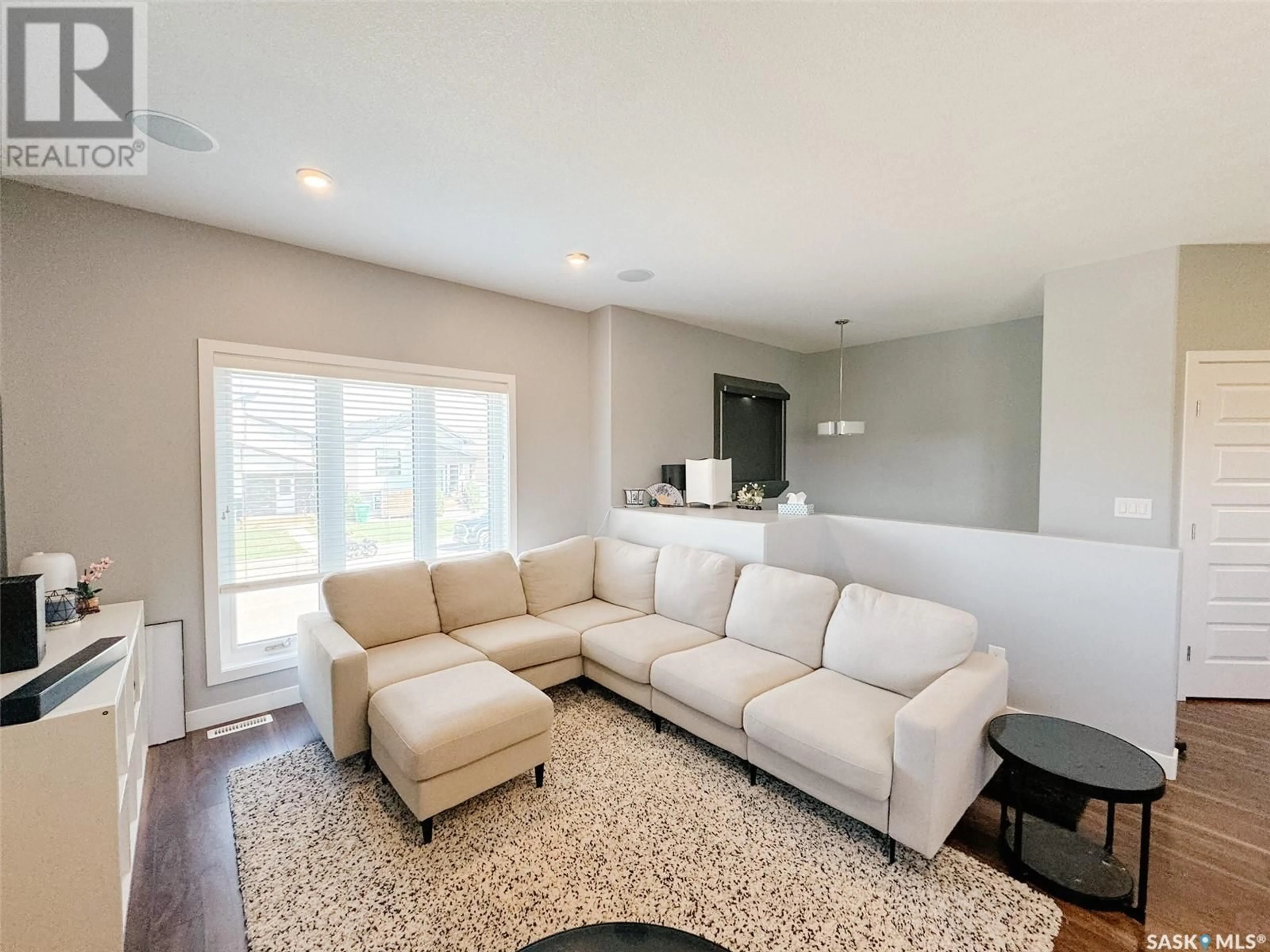 Living room with furniture, unknown for 575 MARLATTE LANE, Saskatoon Saskatchewan S7W0S8