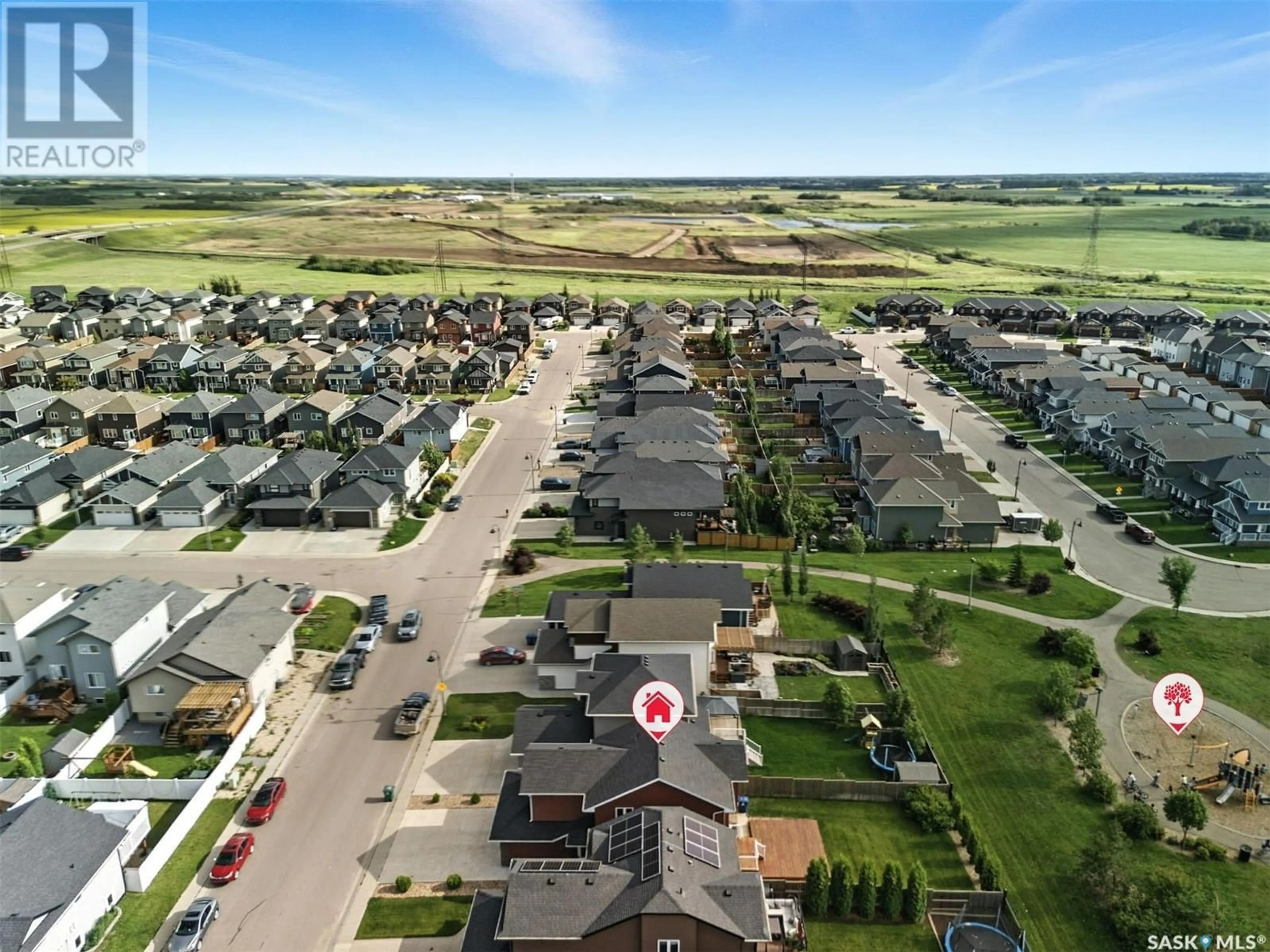 A pic from outside/outdoor area/front of a property/back of a property/a pic from drone, street for 410 KOLYNCHUK CRESCENT, Saskatoon Saskatchewan S7T0W4