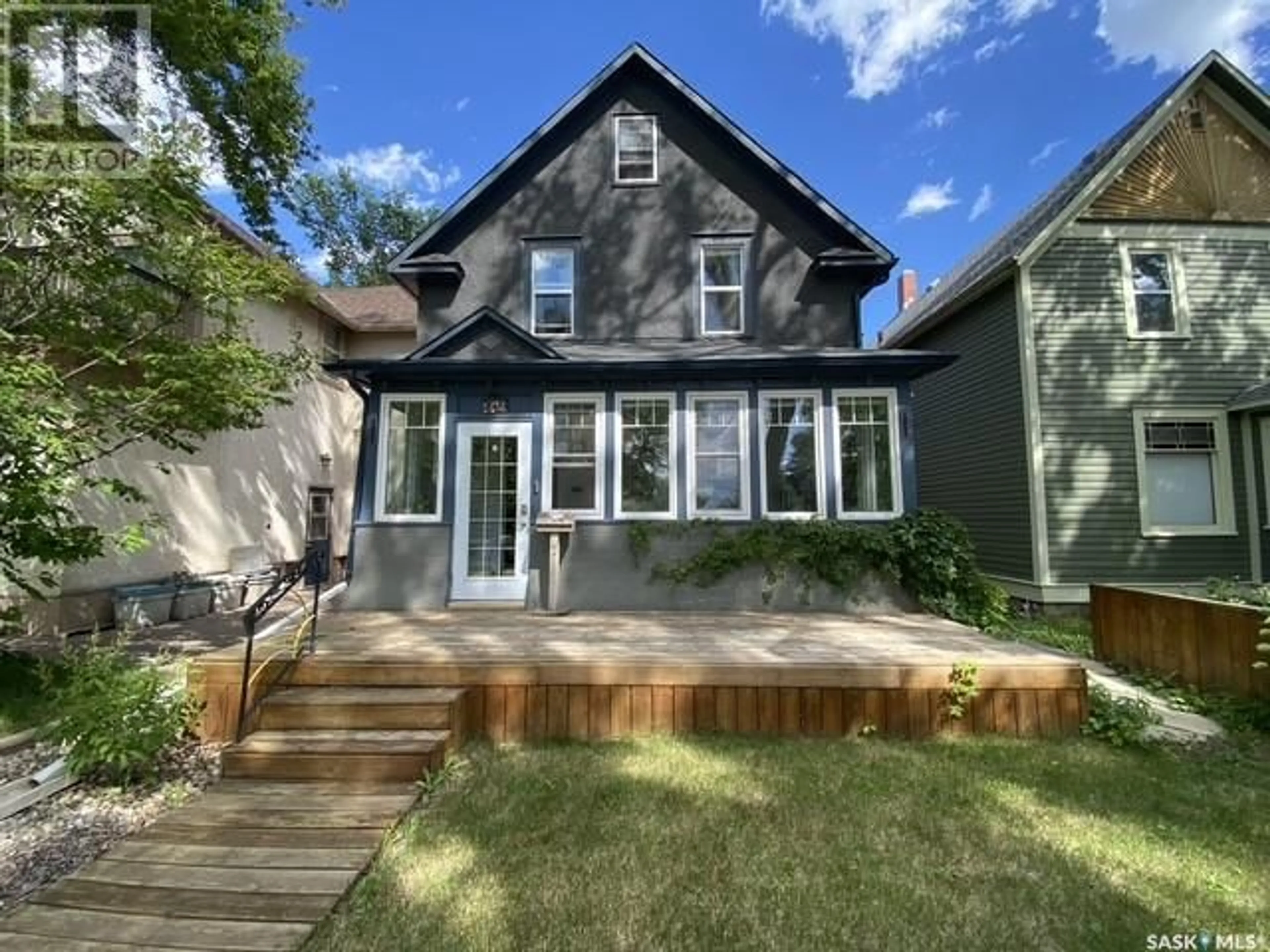 Home with vinyl exterior material, street for 715 DUFFERIN AVENUE, Saskatoon Saskatchewan S7N1C3