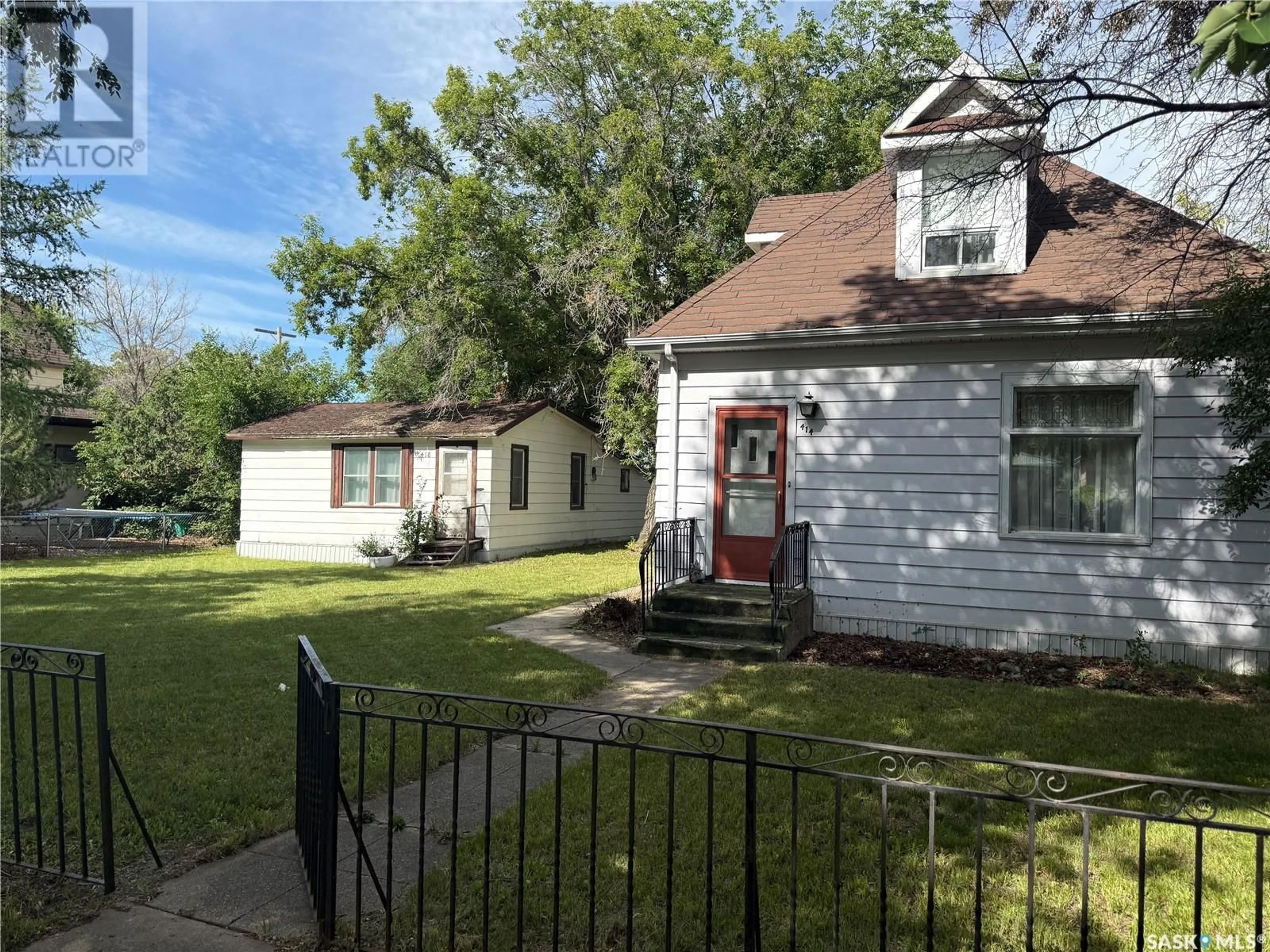 A pic from outside/outdoor area/front of a property/back of a property/a pic from drone, street for 414 PANGMAN STREET, Outlook Saskatchewan S0L2N0