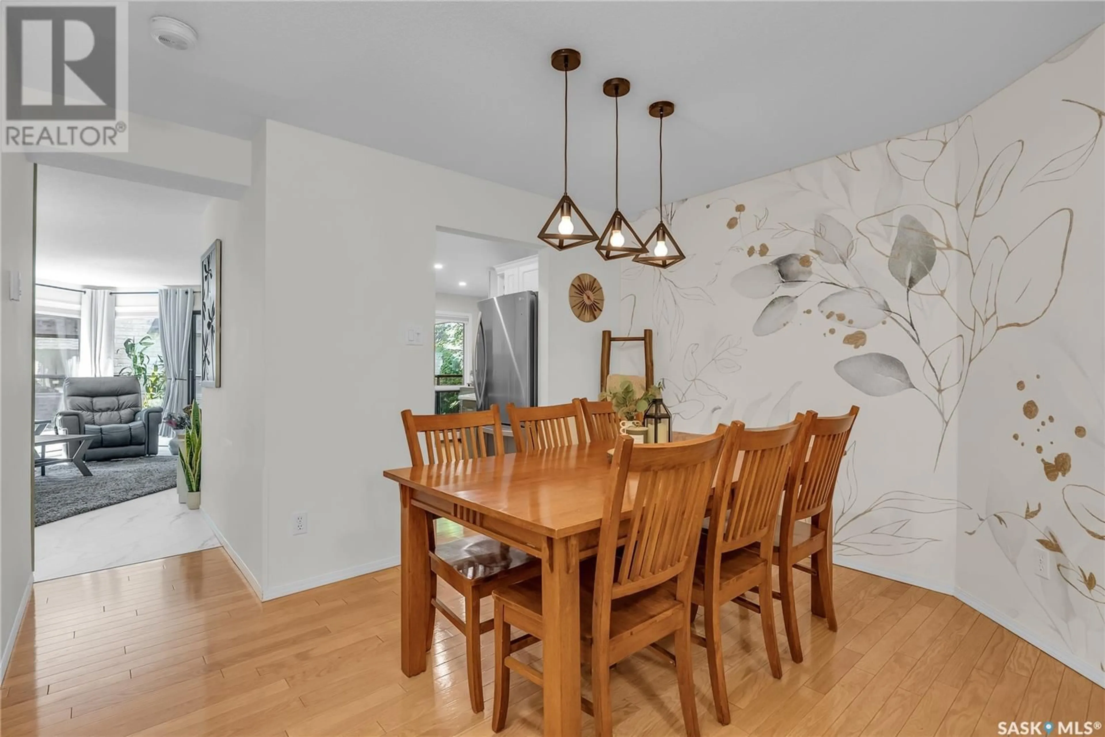 Dining room, wood/laminate floor for 105 - 2305 ADELAIDE STREET E, Saskatoon Saskatchewan S7J5H6
