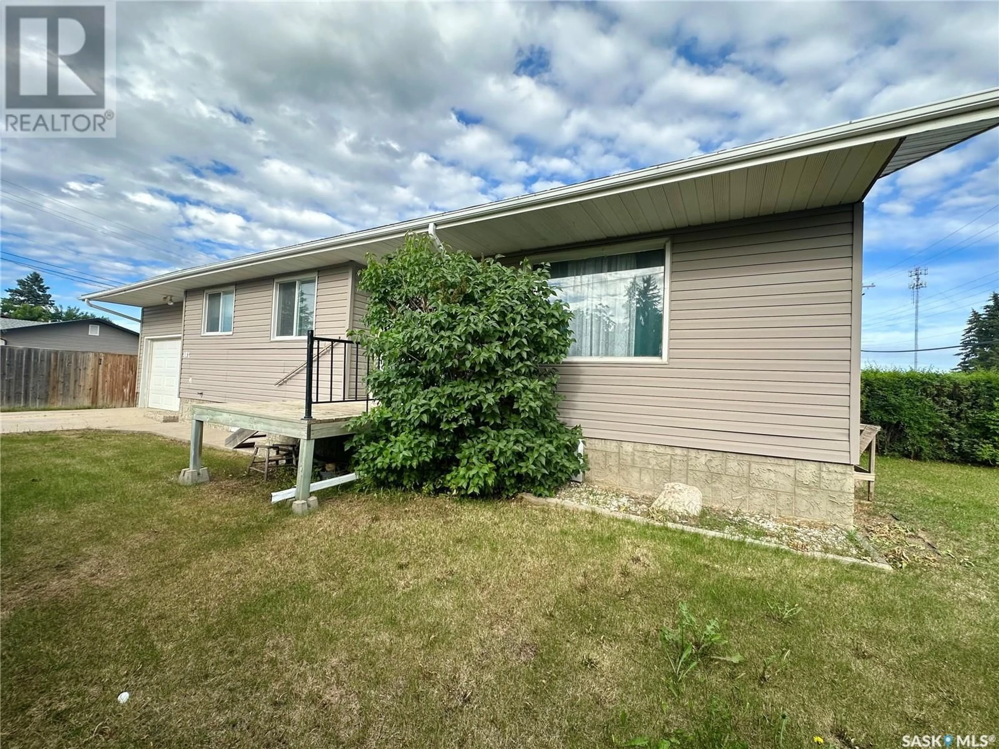 A pic from outside/outdoor area/front of a property/back of a property/a pic from drone, water/lake/river/ocean view for E - 401 1ST AVENUE, Spiritwood Saskatchewan S0J2M0