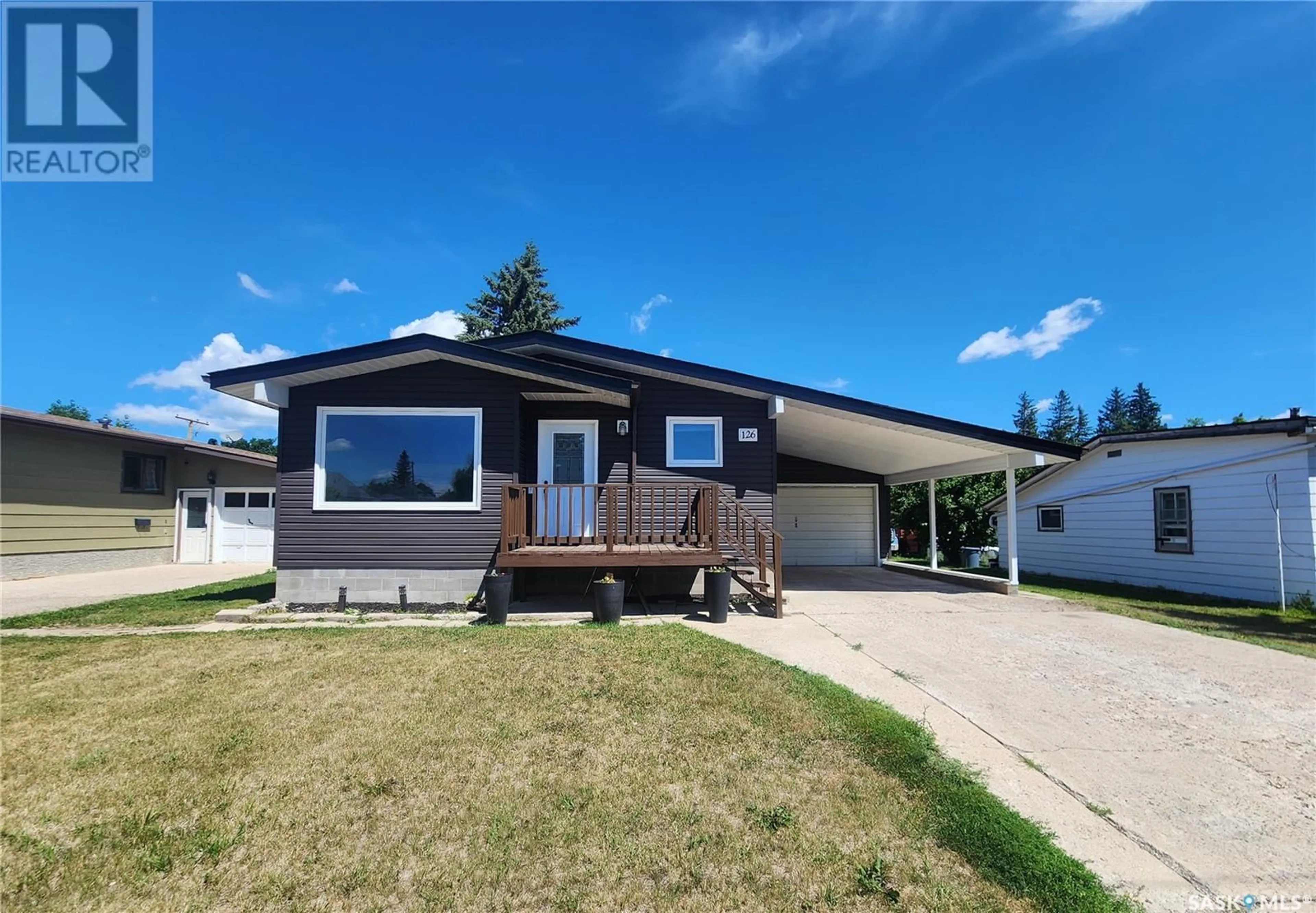 Home with vinyl exterior material, street for 126 11TH AVENUE, Melville Saskatchewan S0A2P0