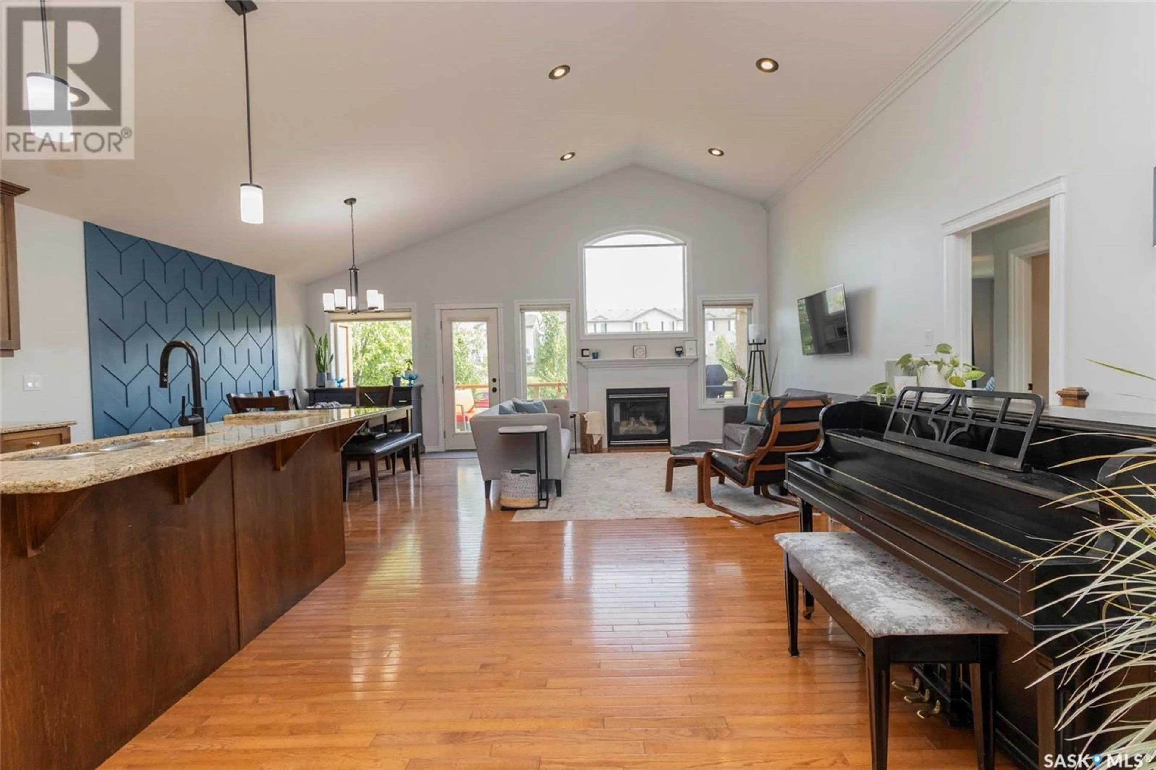 Open concept kitchen, wood/laminate floor for 619 BELLMONT CRESCENT, Saskatoon Saskatchewan S7V1K7