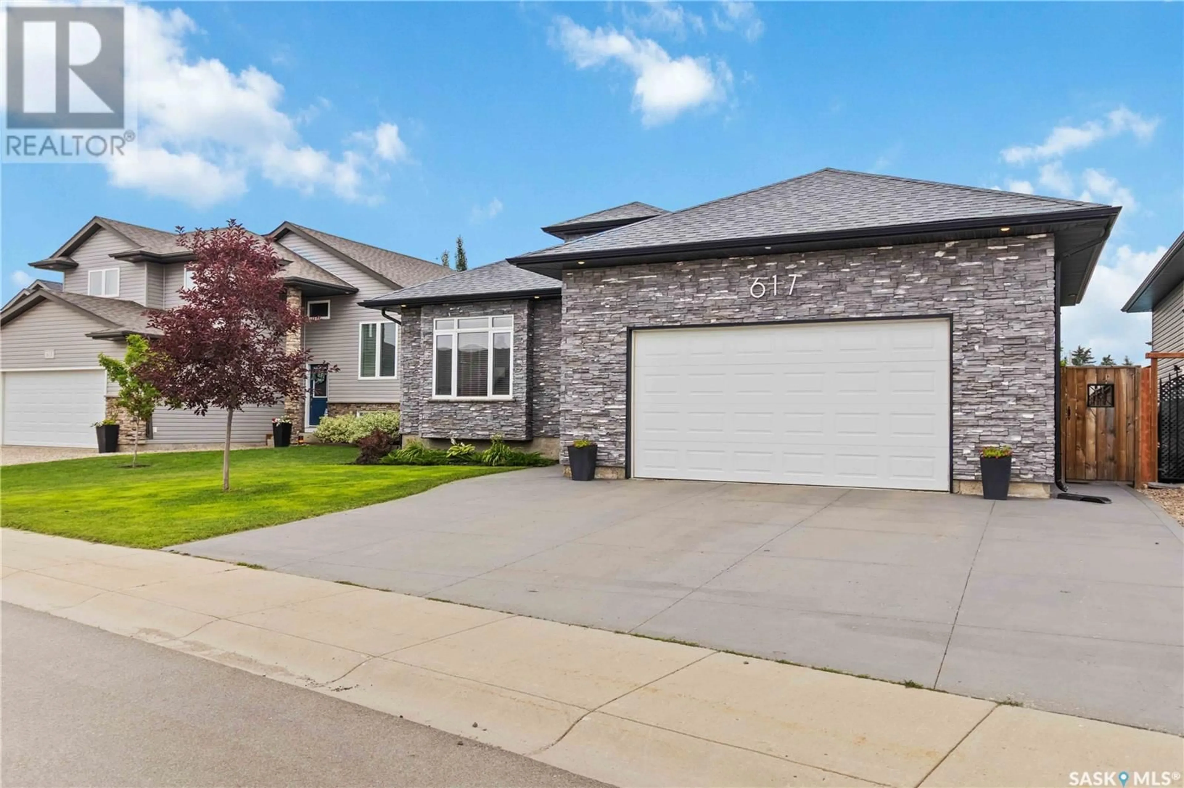 Home with brick exterior material, street for 617 REIMER ROAD, Martensville Saskatchewan S0K0A2