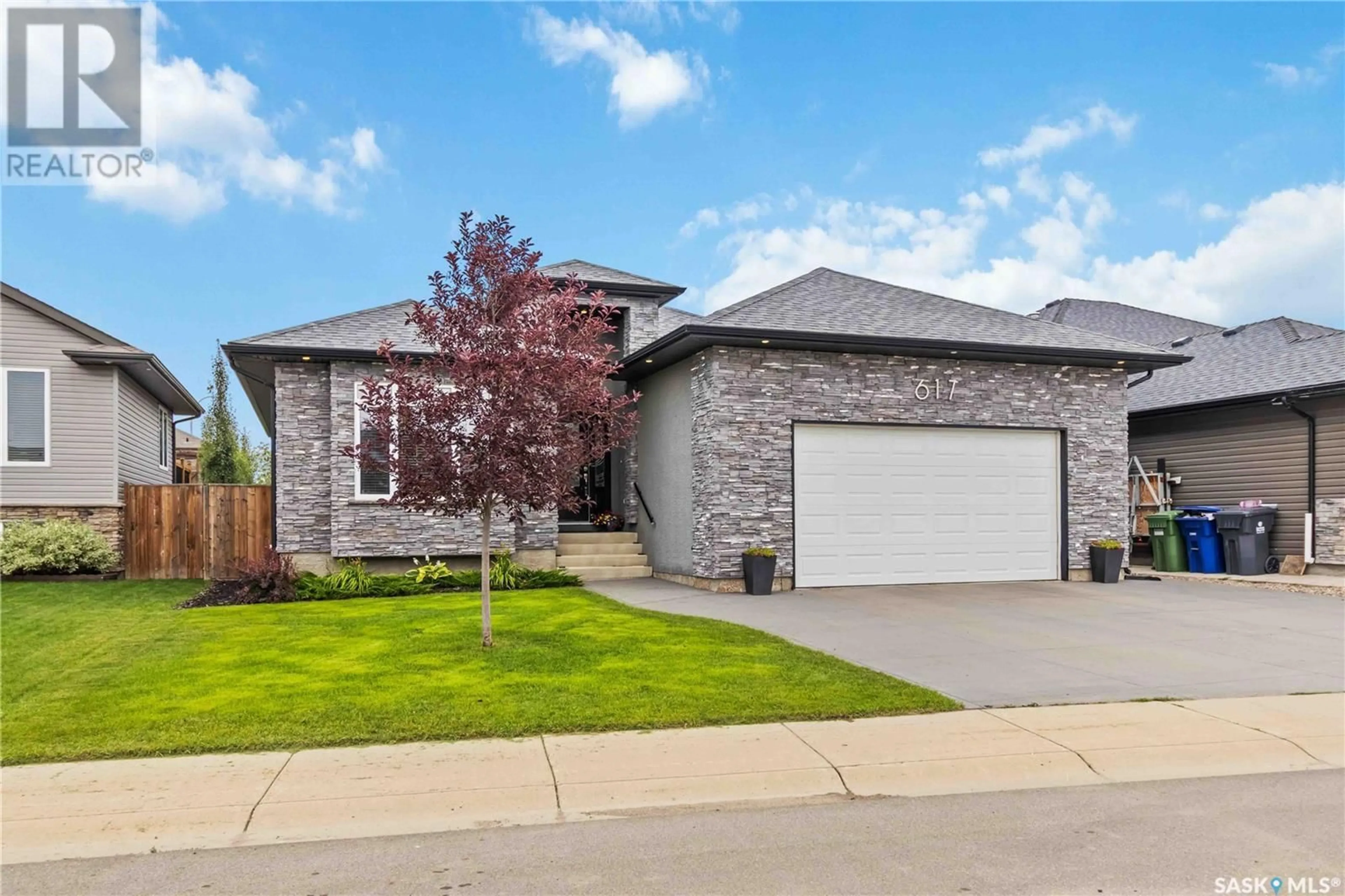 Home with brick exterior material, street for 617 REIMER ROAD, Martensville Saskatchewan S0K0A2