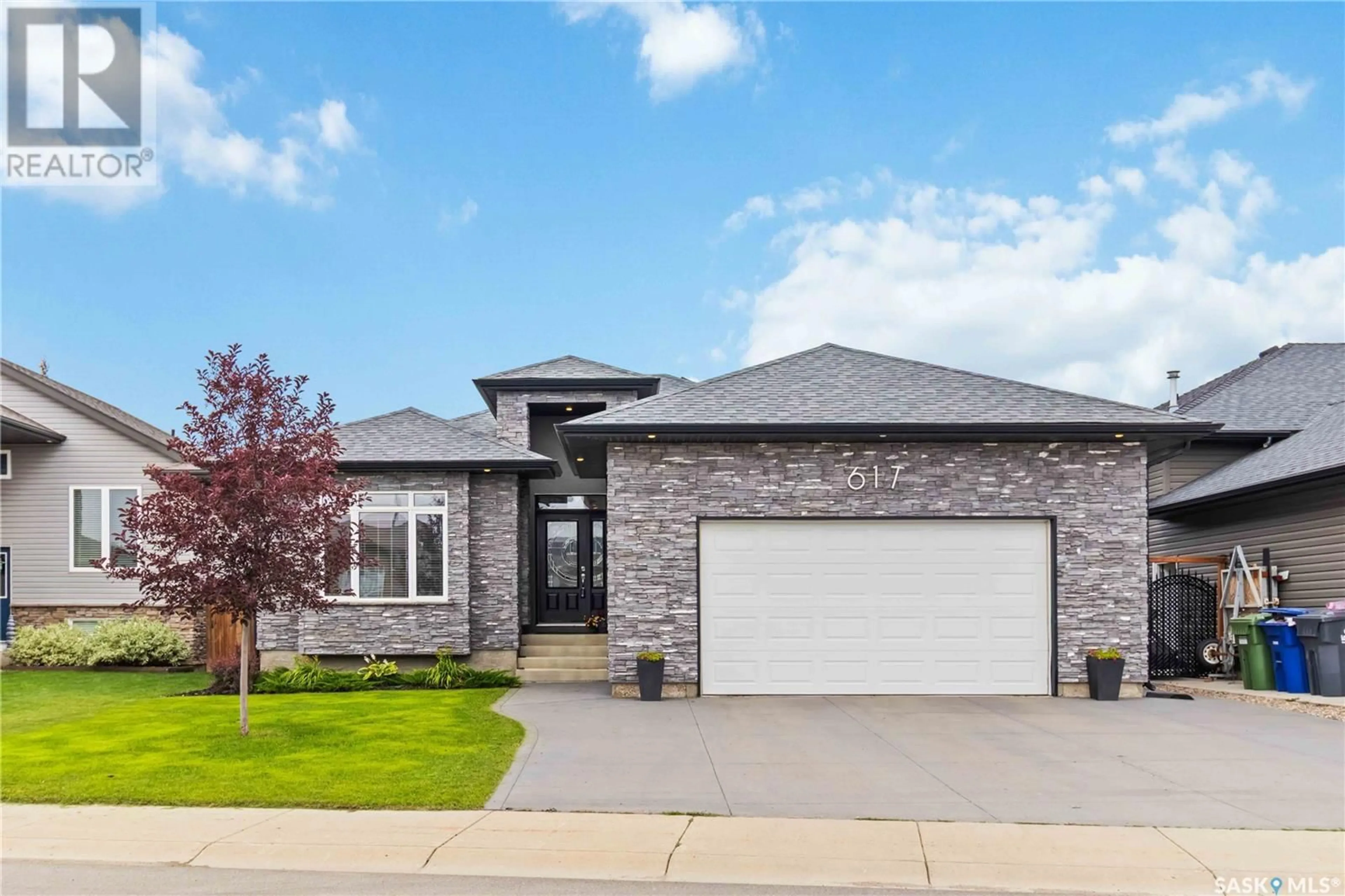 Home with brick exterior material, street for 617 REIMER ROAD, Martensville Saskatchewan S0K0A2
