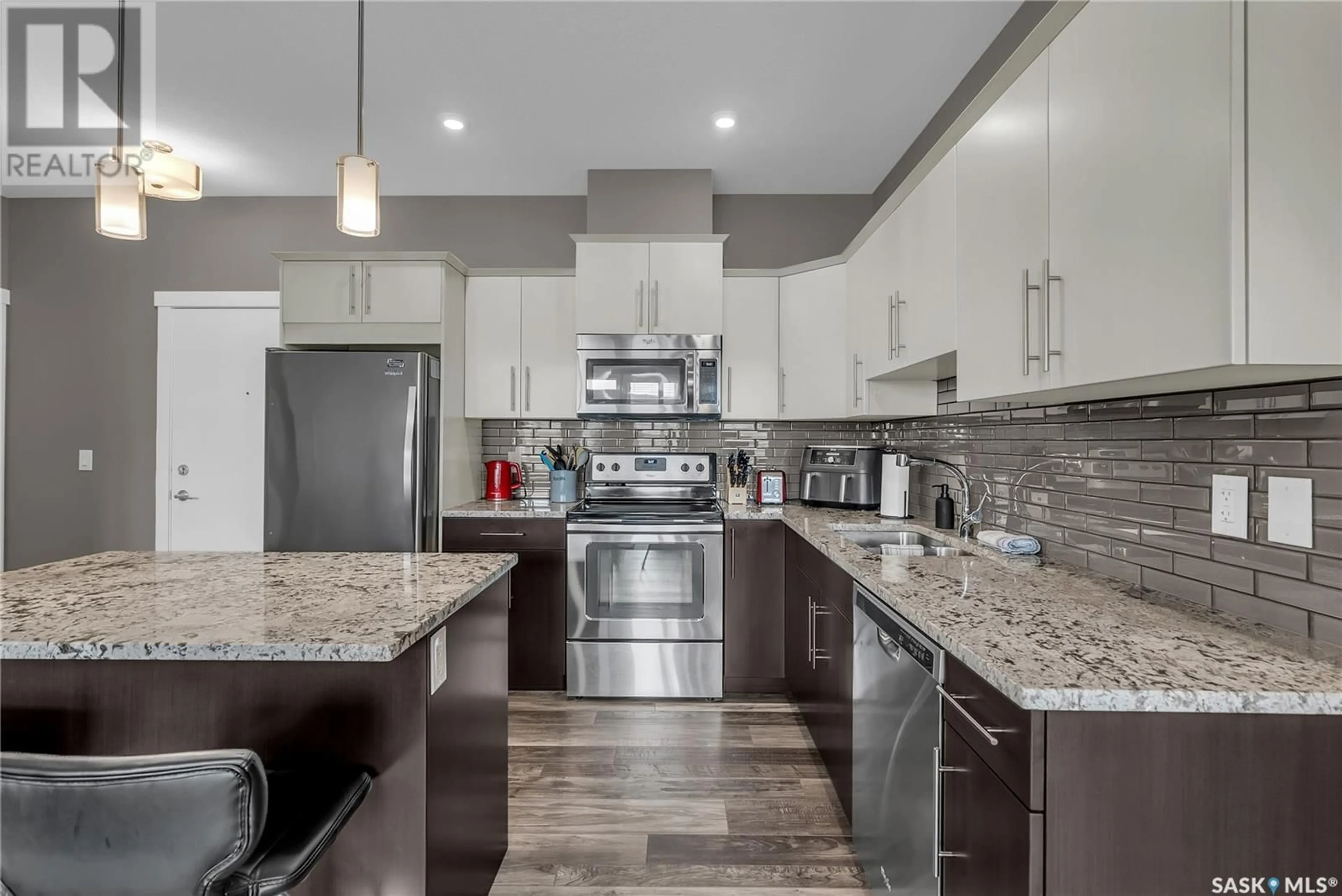 Open concept kitchen, ceramic/tile floor for 415 - 212 MANINGAS BEND, Saskatoon Saskatchewan S7W0T6