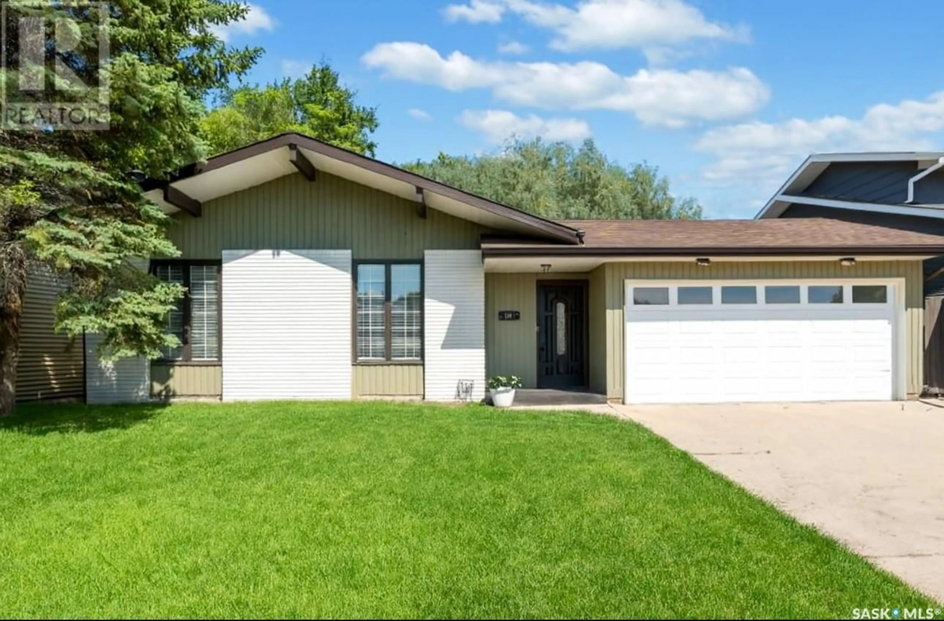 Home with vinyl exterior material, street for 355 THAIN CRESCENT, Saskatoon Saskatchewan S7K6N1