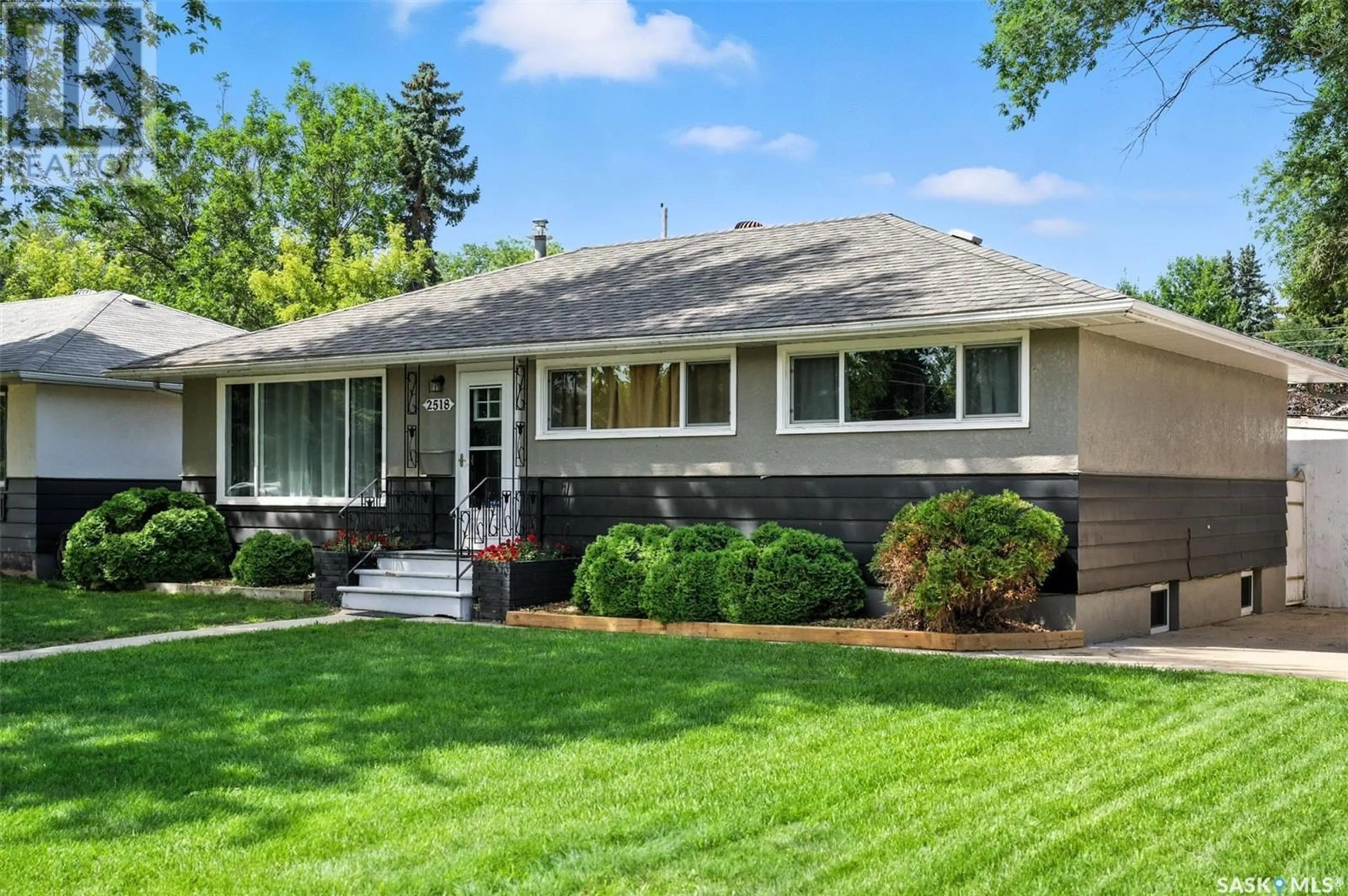 Home with vinyl exterior material, street for 2518 WILLIAM AVENUE, Saskatoon Saskatchewan S7J1B3