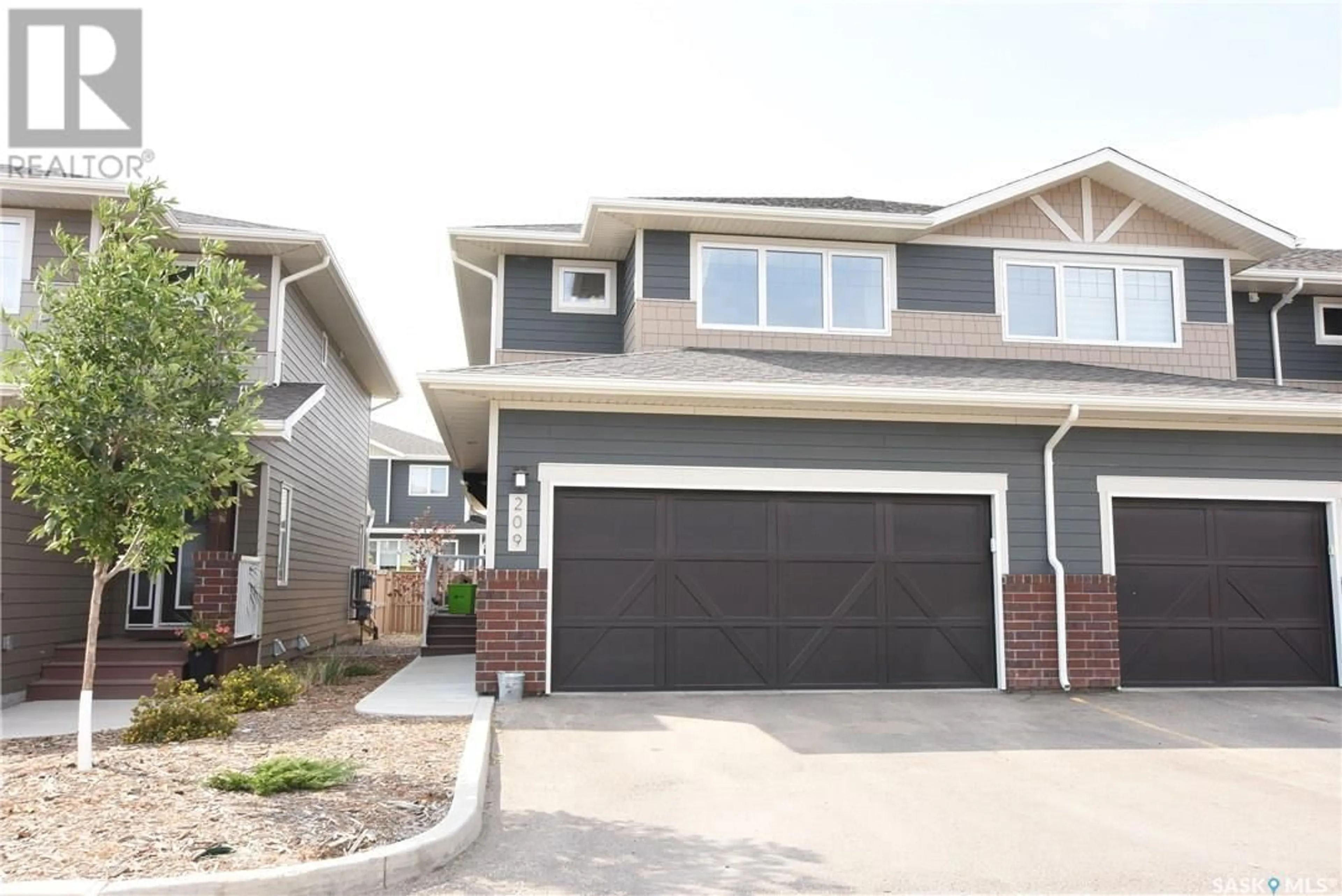 Home with vinyl exterior material, street for 209 - 4002 SANDHILL CRESCENT, Regina Saskatchewan S4V3J1