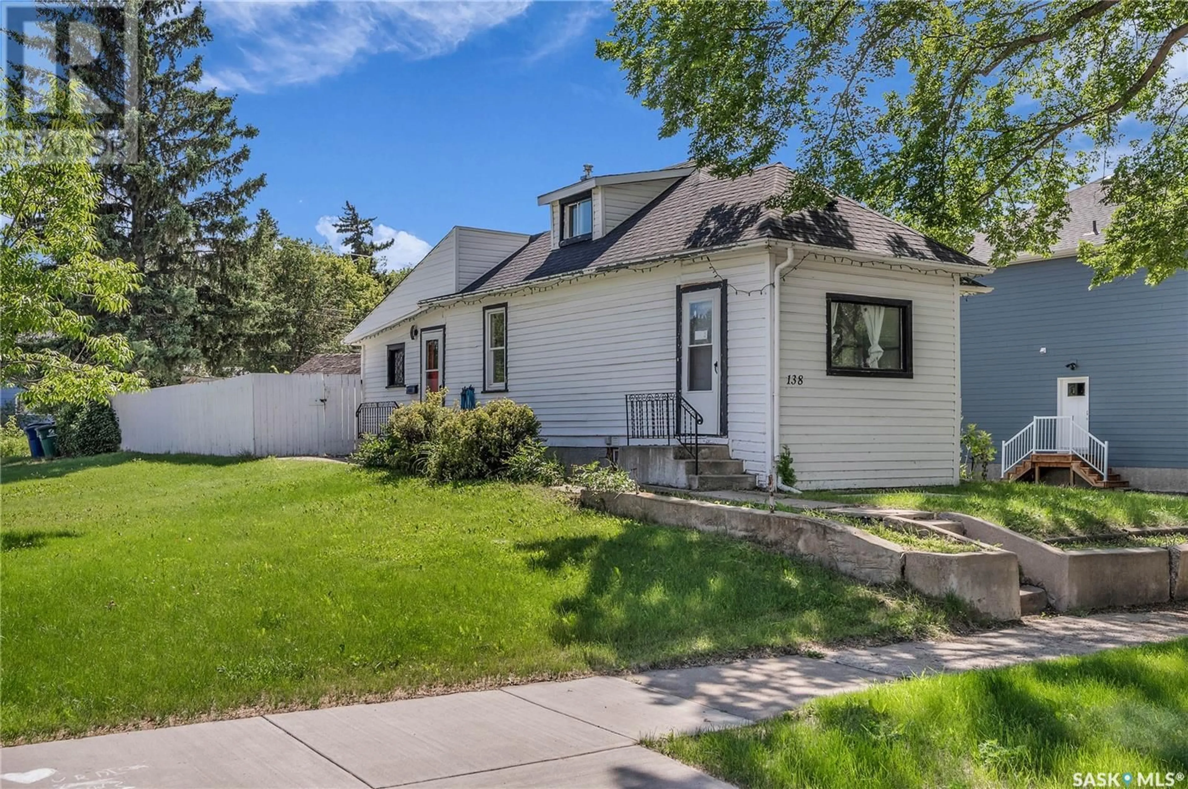 Home with vinyl exterior material, street for 138 4TH STREET, Saskatoon Saskatchewan S7H1H8