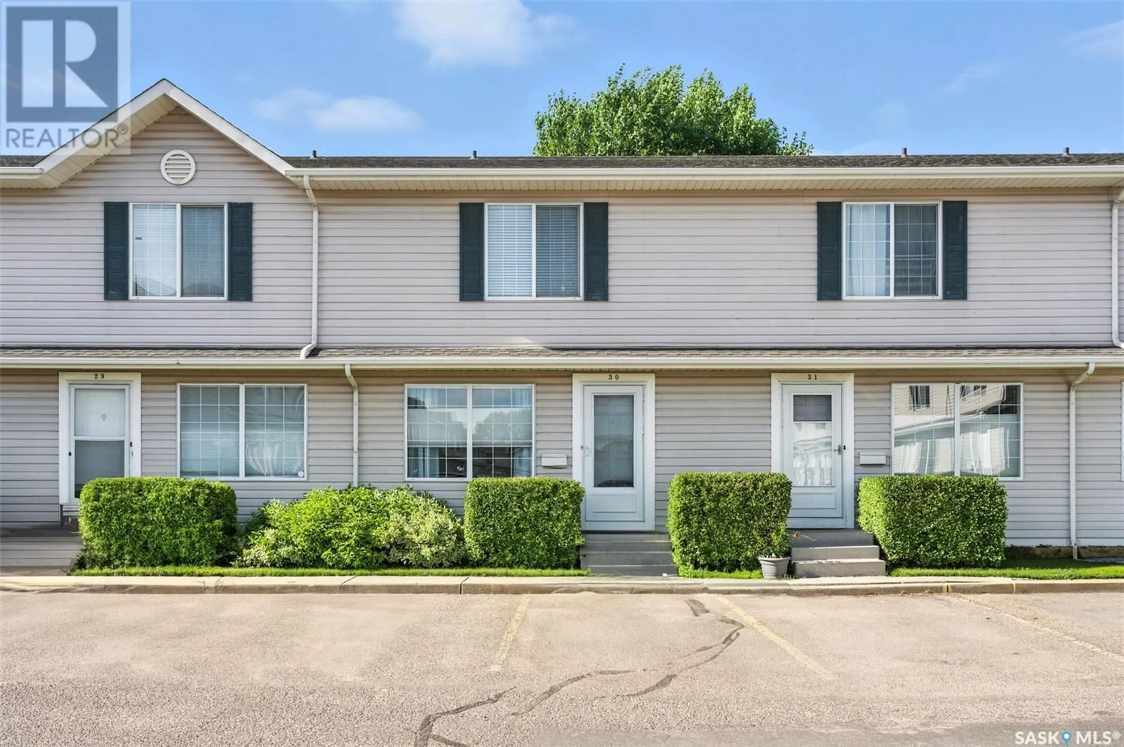 Home with vinyl exterior material, street for 30 KRISTJANSON ROAD, Saskatoon Saskatchewan S7S1M8