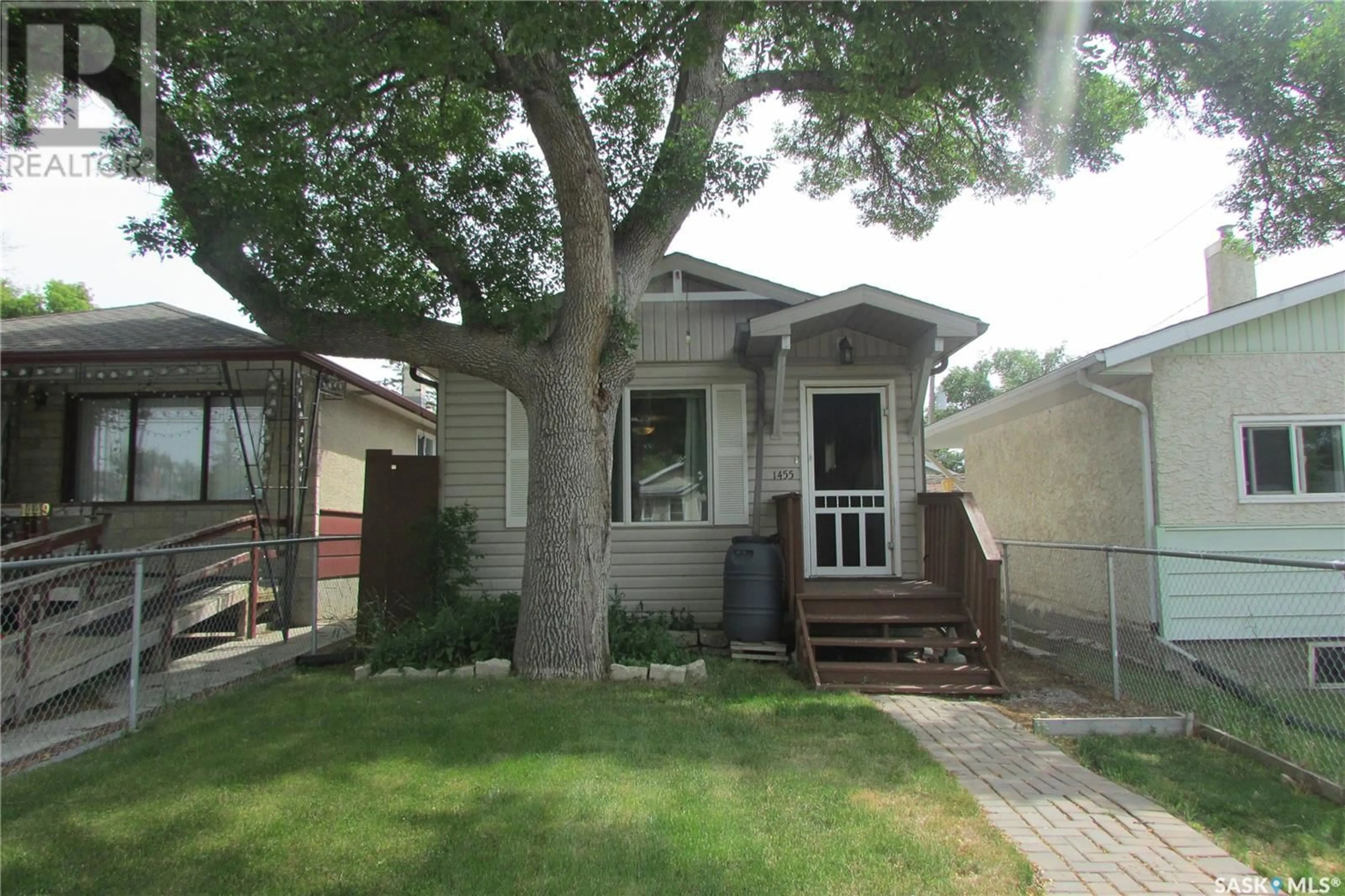 Home with vinyl exterior material, street for 1455 CONNAUGHT STREET, Regina Saskatchewan S4T4T1