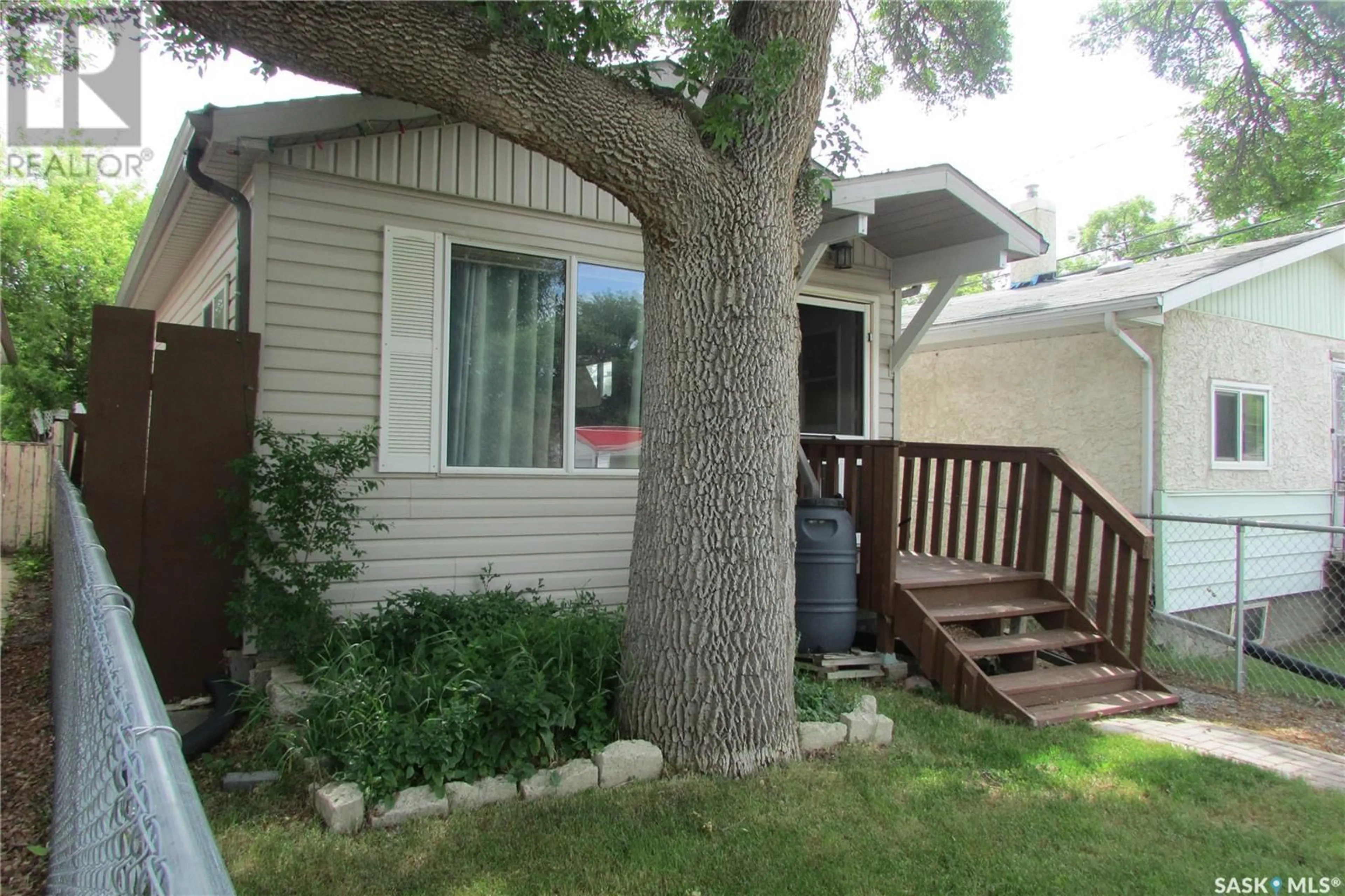 Home with vinyl exterior material, street for 1455 CONNAUGHT STREET, Regina Saskatchewan S4T4T1