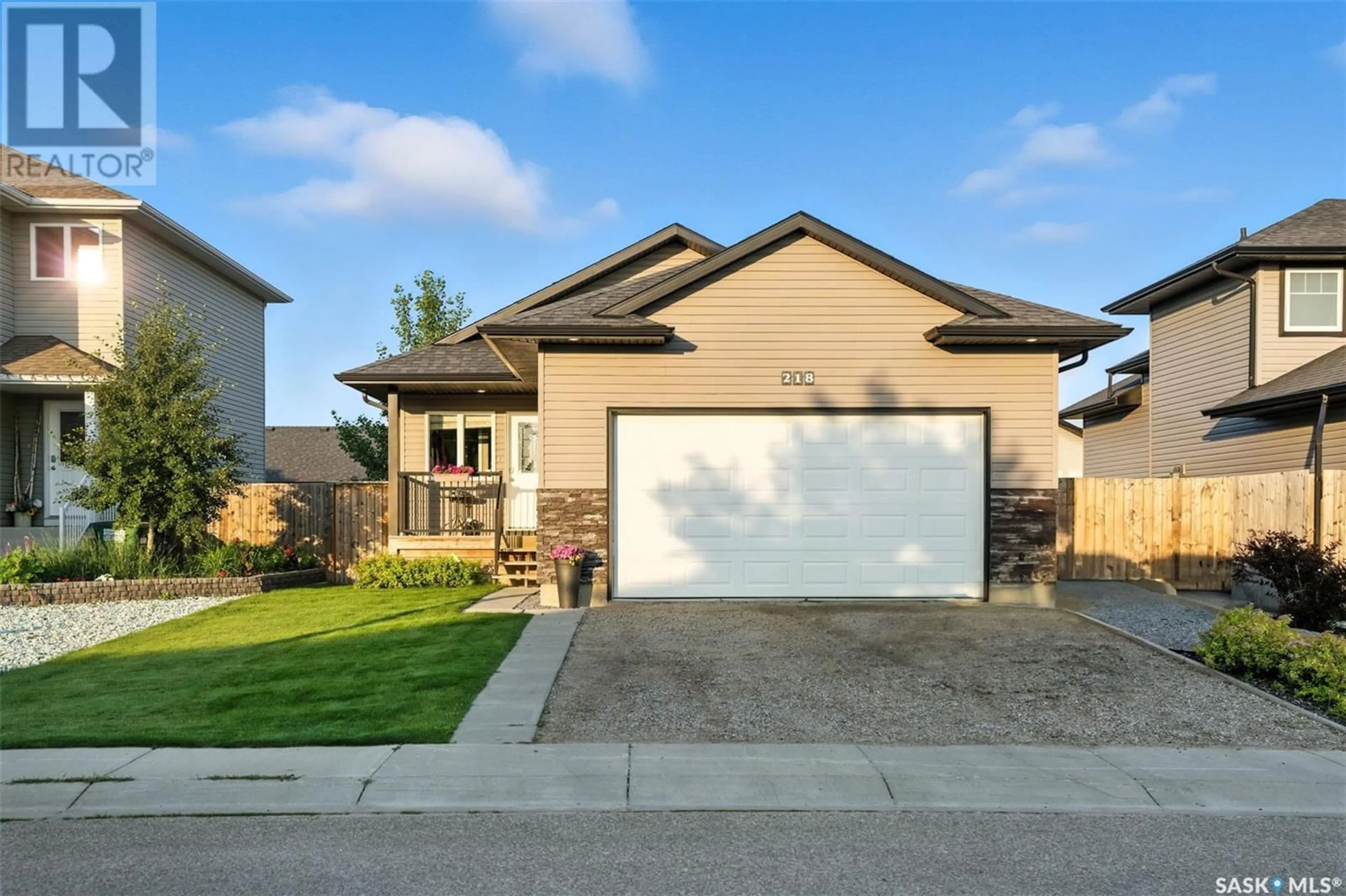 Home with brick exterior material, street for 218 MCCALLUM WAY, Saskatoon Saskatchewan S7R0H7