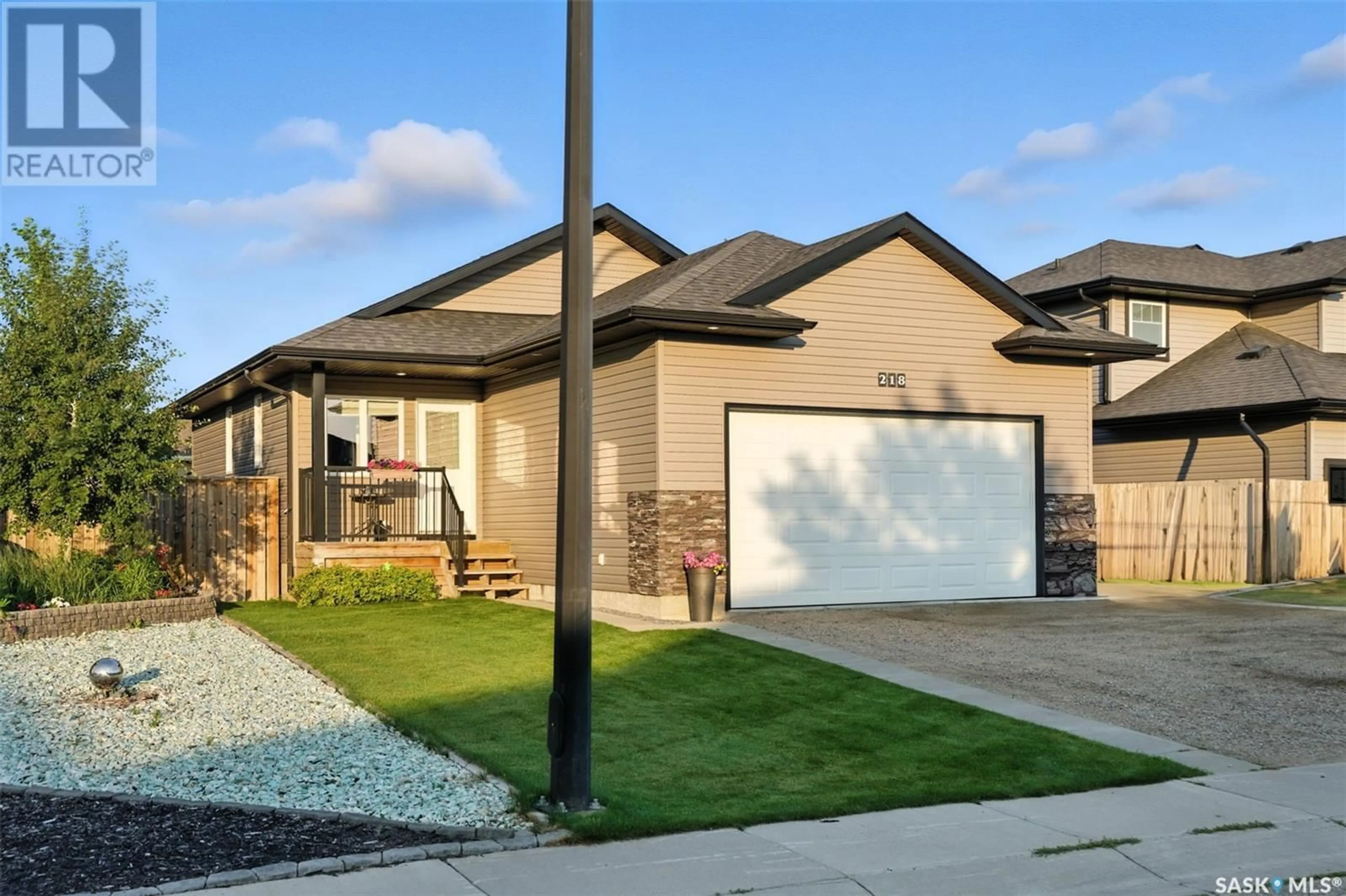 Home with brick exterior material, street for 218 MCCALLUM WAY, Saskatoon Saskatchewan S7R0H7
