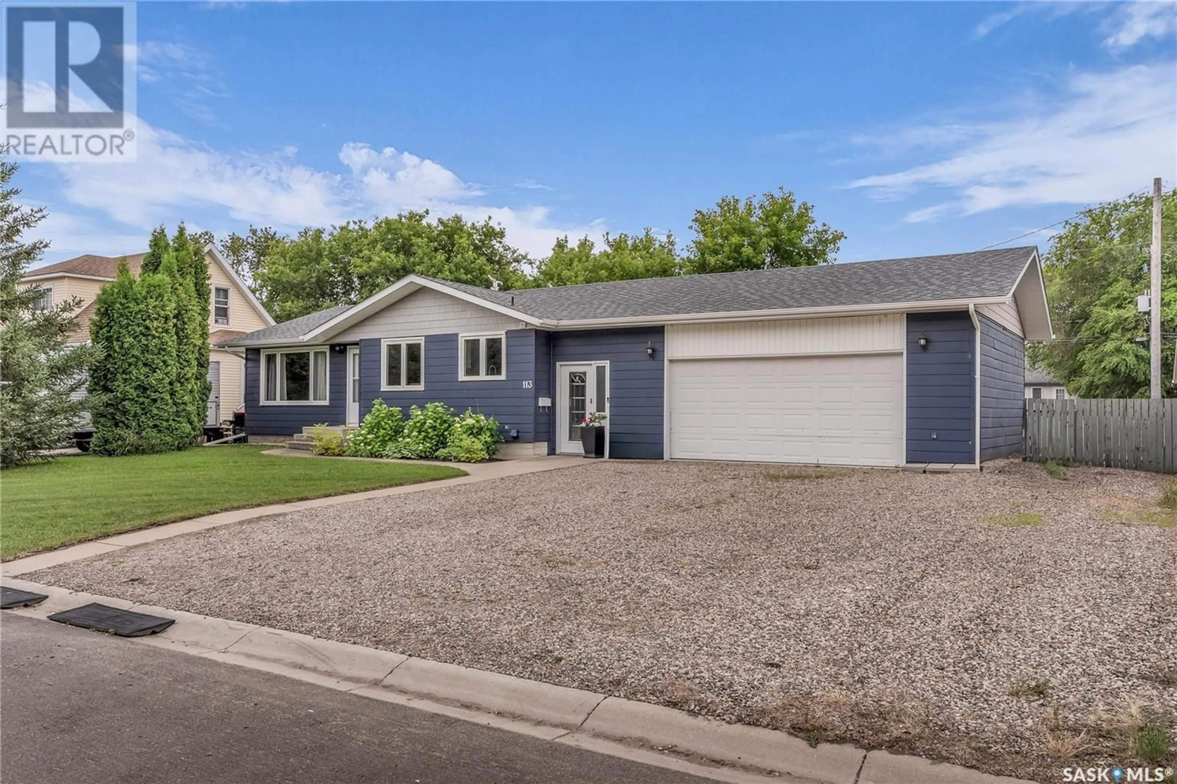 Home with vinyl exterior material, street for 113 RIGMOR STREET, Warman Saskatchewan S0K0A1
