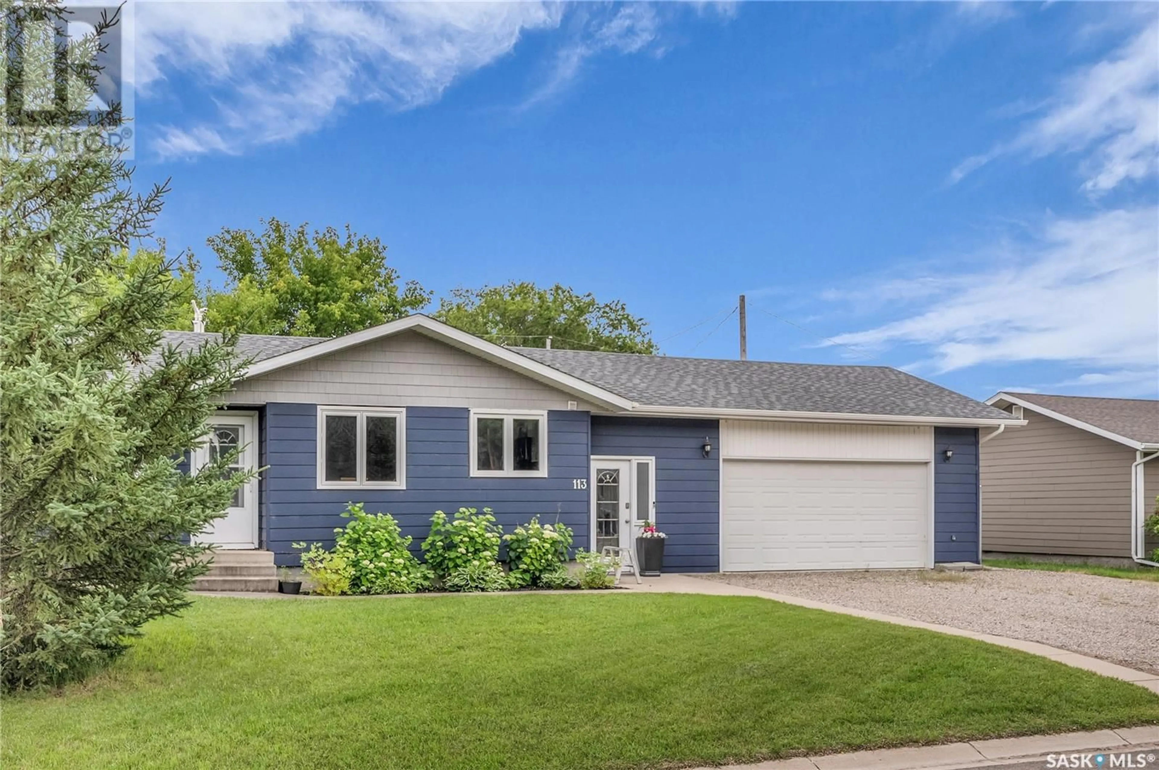 Home with vinyl exterior material, street for 113 RIGMOR STREET, Warman Saskatchewan S0K0A1