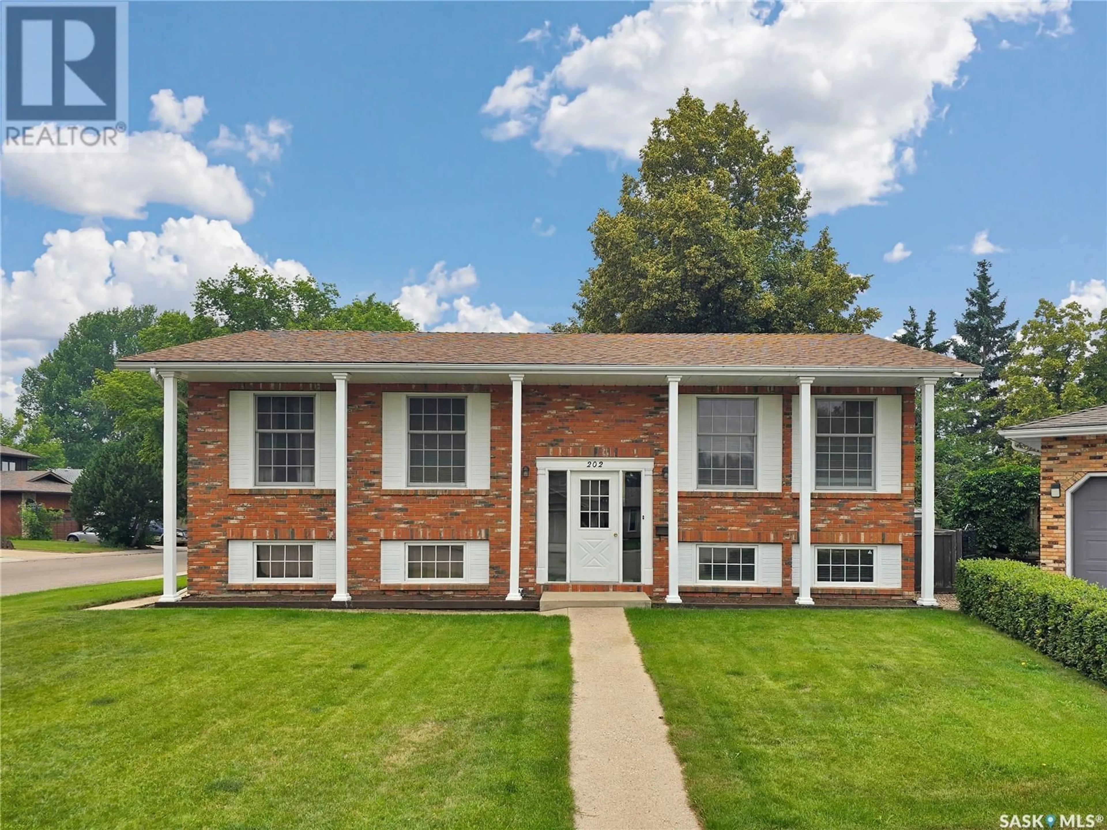 Home with brick exterior material, building for 202 NOKOMIS BAY, Saskatoon Saskatchewan S7K5C8