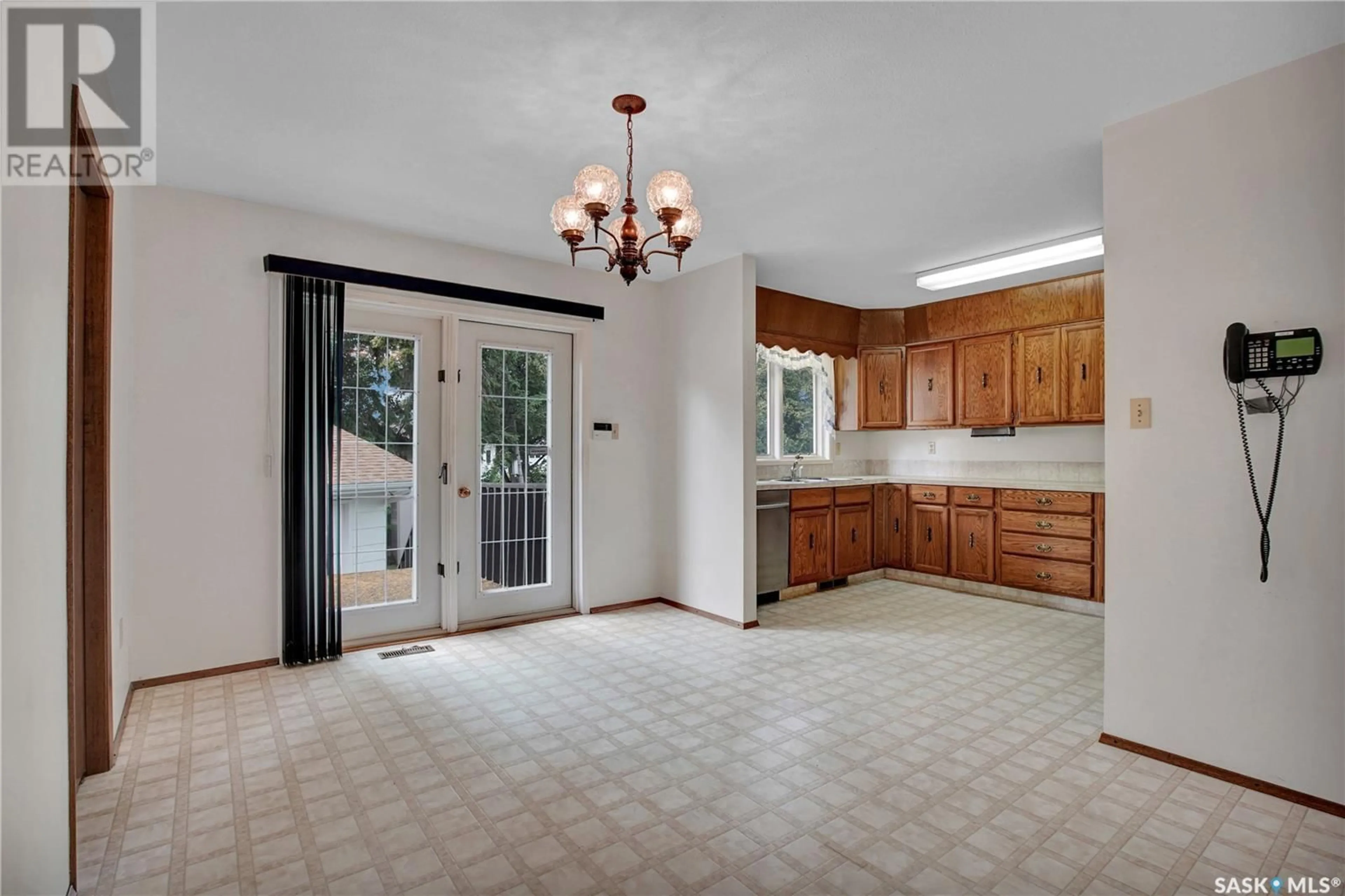 Open concept kitchen, ceramic/tile floor for 202 NOKOMIS BAY, Saskatoon Saskatchewan S7K5C8