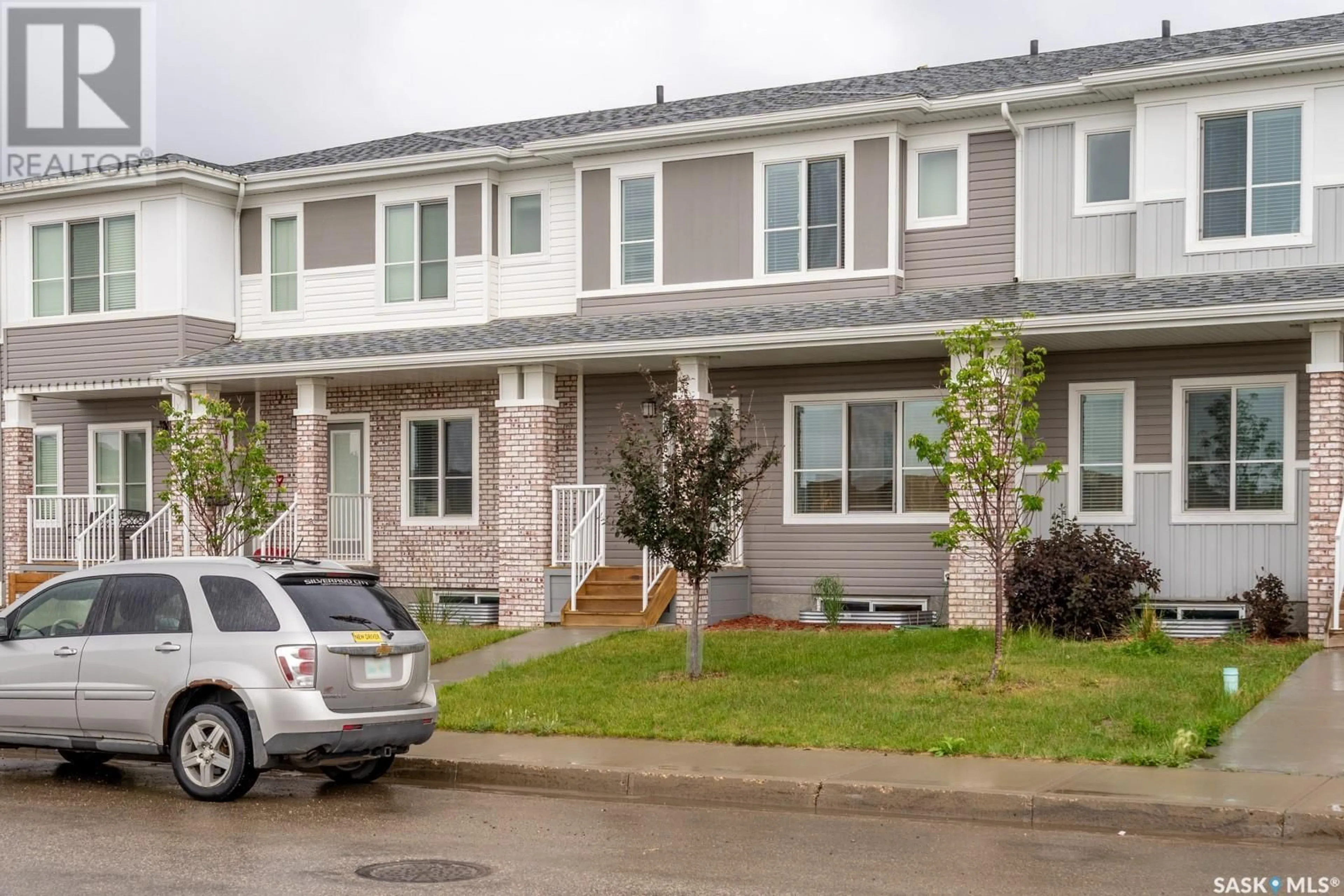 Home with vinyl exterior material, street for 5008 PRIMROSE GREEN DRIVE, Regina Saskatchewan S4V3S5