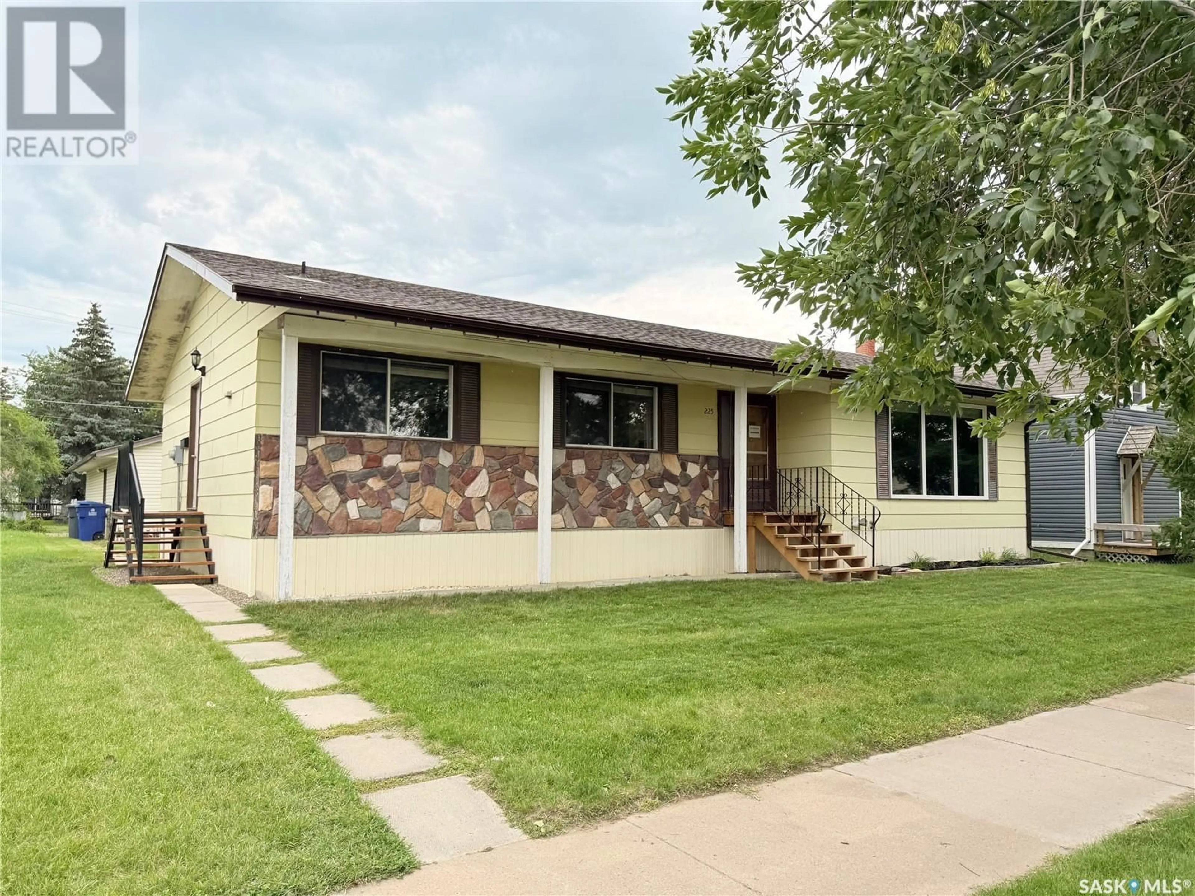 Home with vinyl exterior material, street for 223 DOUGLASS STREET, Outlook Saskatchewan S0L2N0